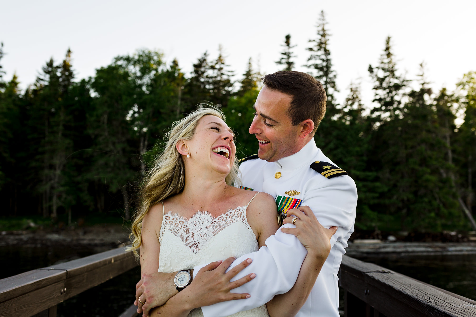 A bride and groom take wedding portraits on Warren Island, near Camden Maine