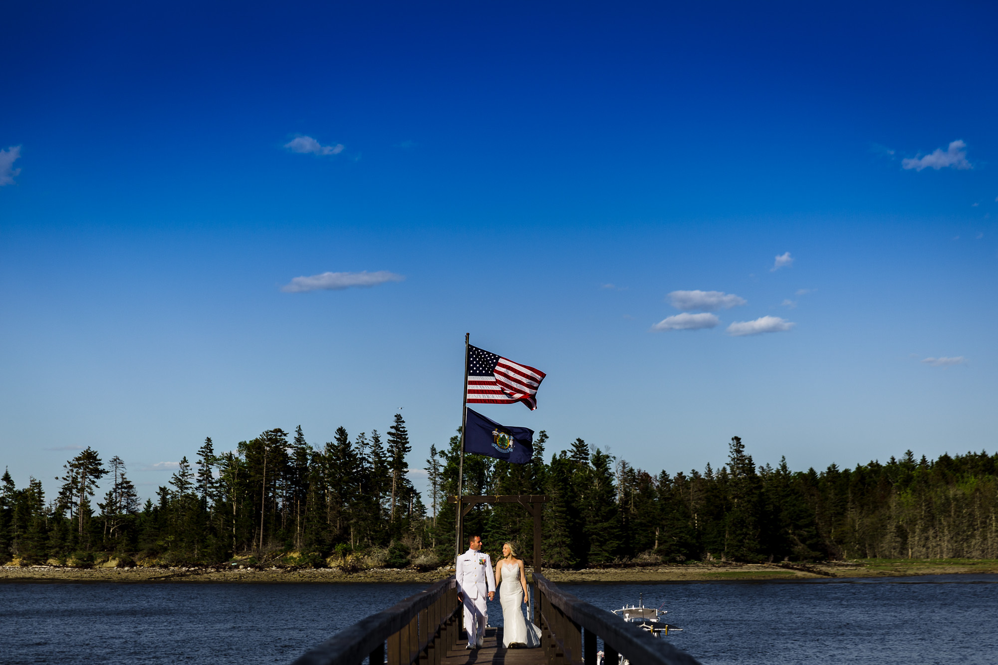 A bride and groom arrive on Warren Island in Maine