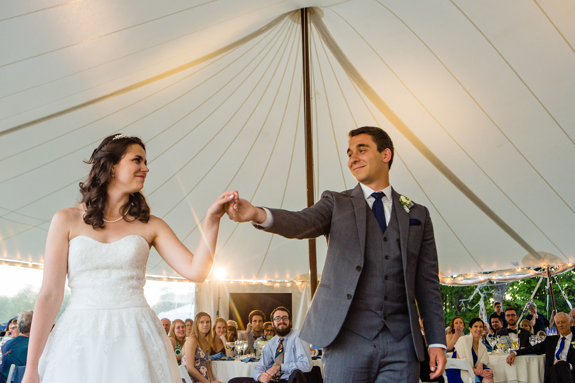 A bride and groom enjoy a first dance at their Maine island wedding.