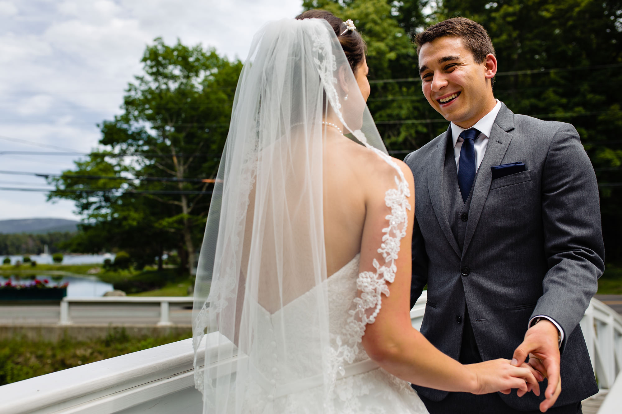 A bride and groom share a first look at their Maine wedding