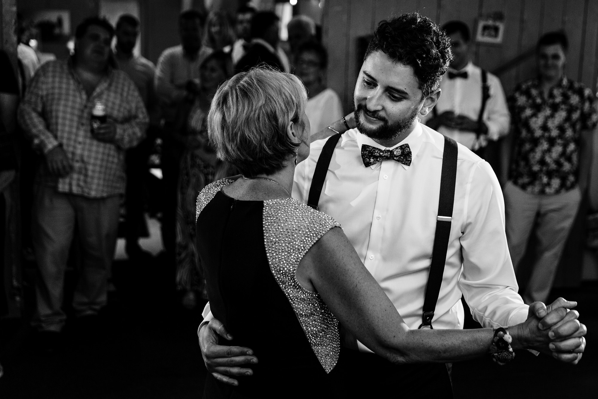 The groom dances with his mother at her wedding in New Harbor, Maine