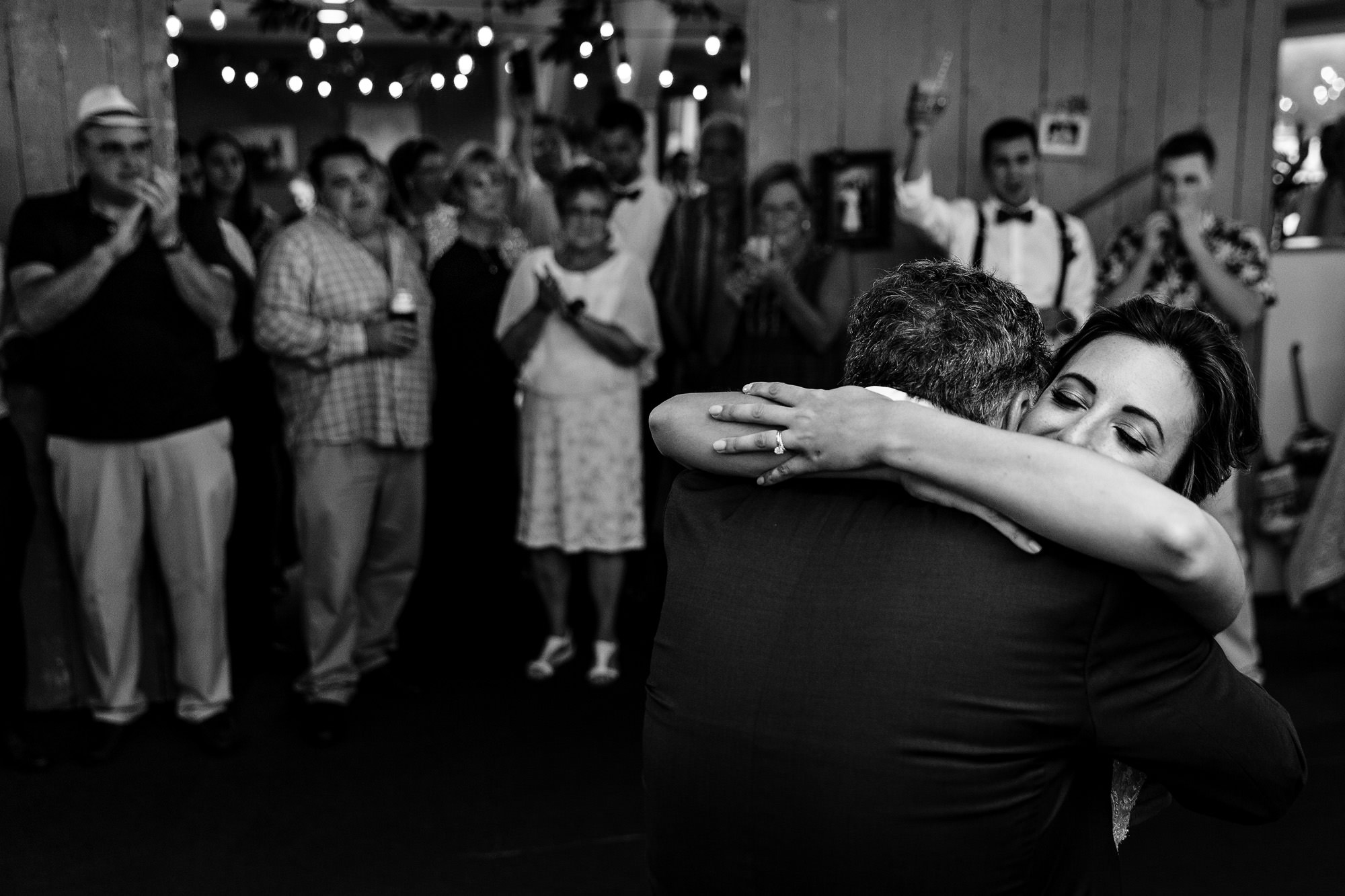 The bride dances with her father at her wedding in New Harbor, Maine
