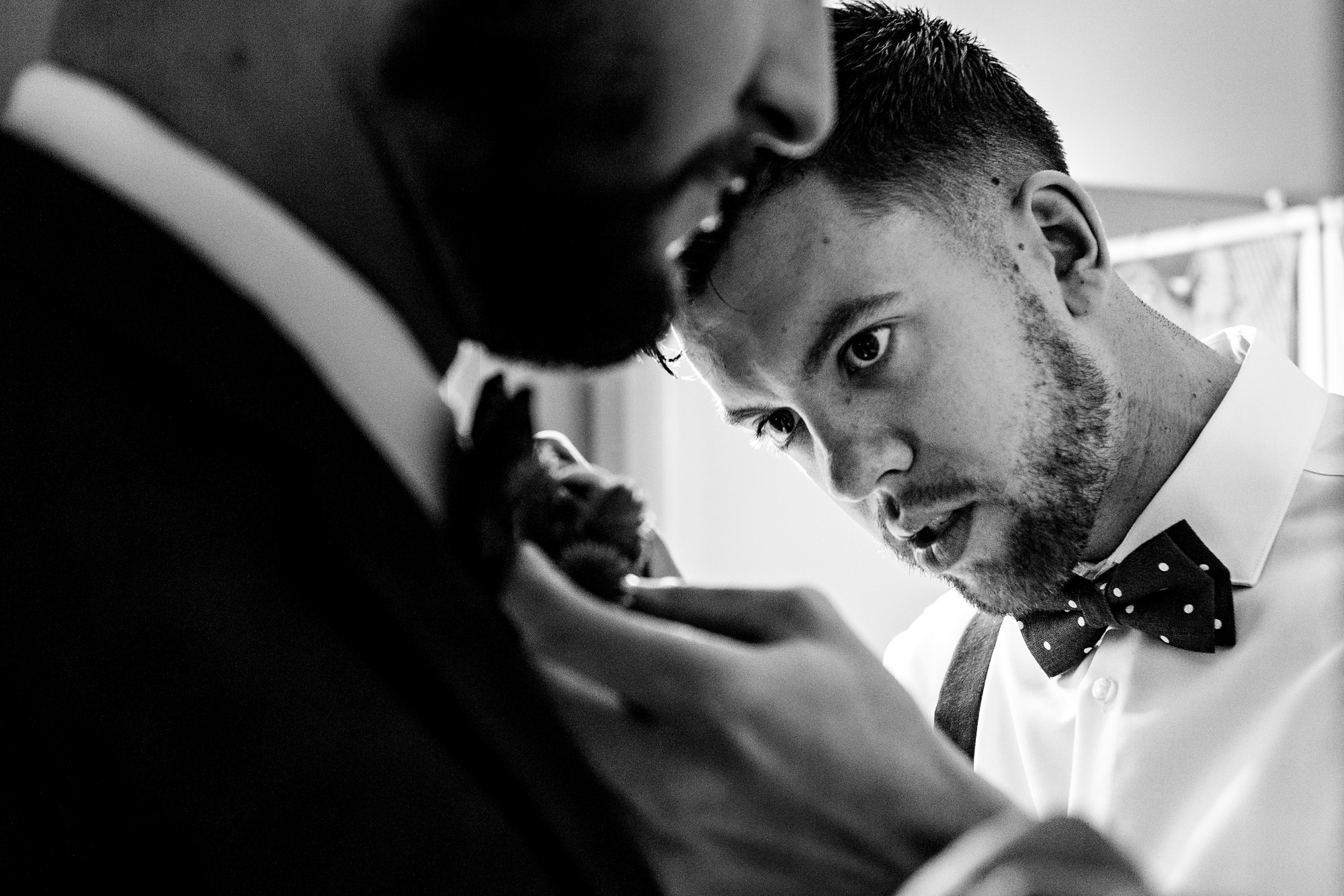 A groom prepares for her New Harbor Maine wedding