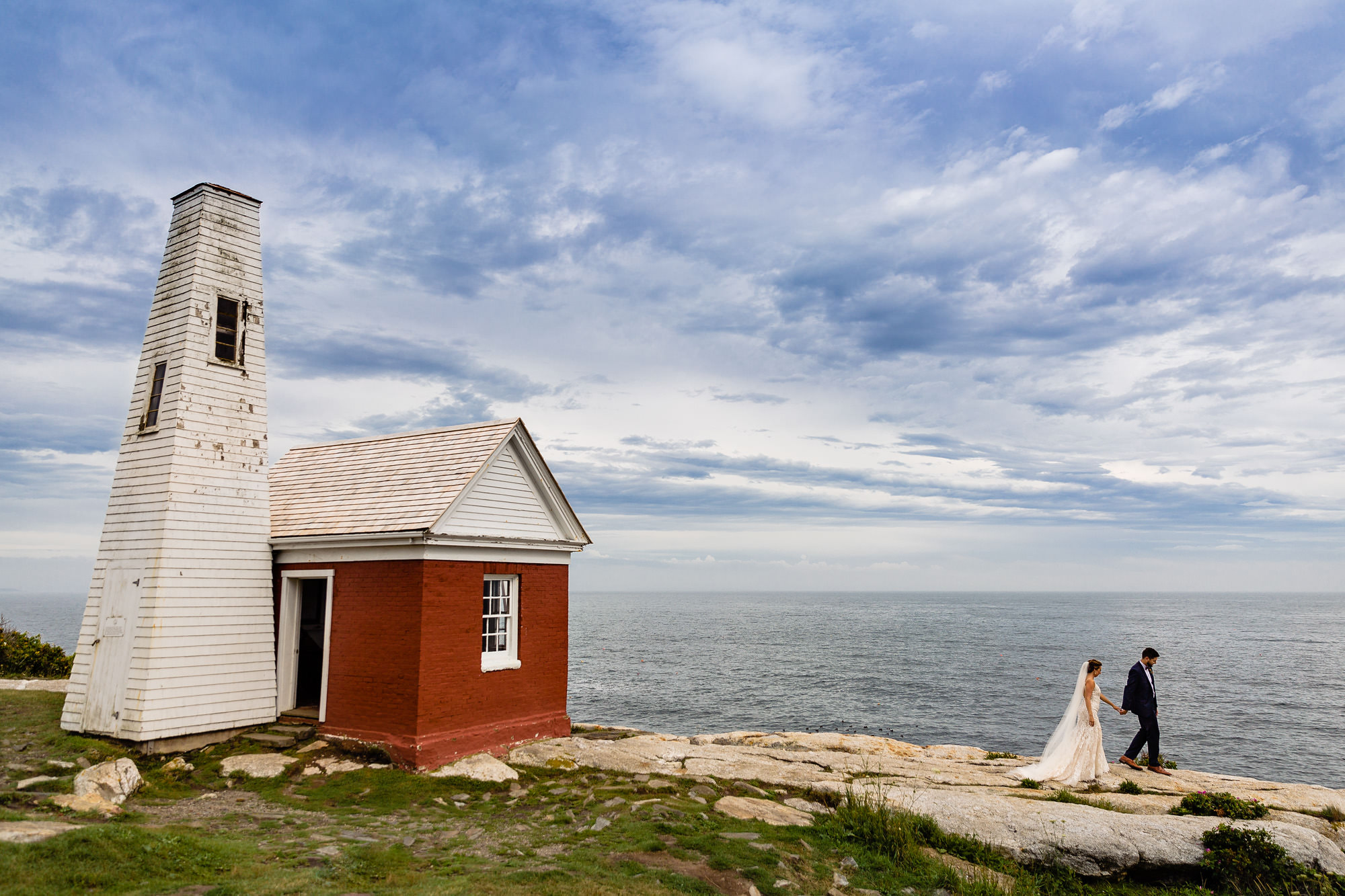 Creative wedding portraits at Pemaquid Point Lighthouse in Maine