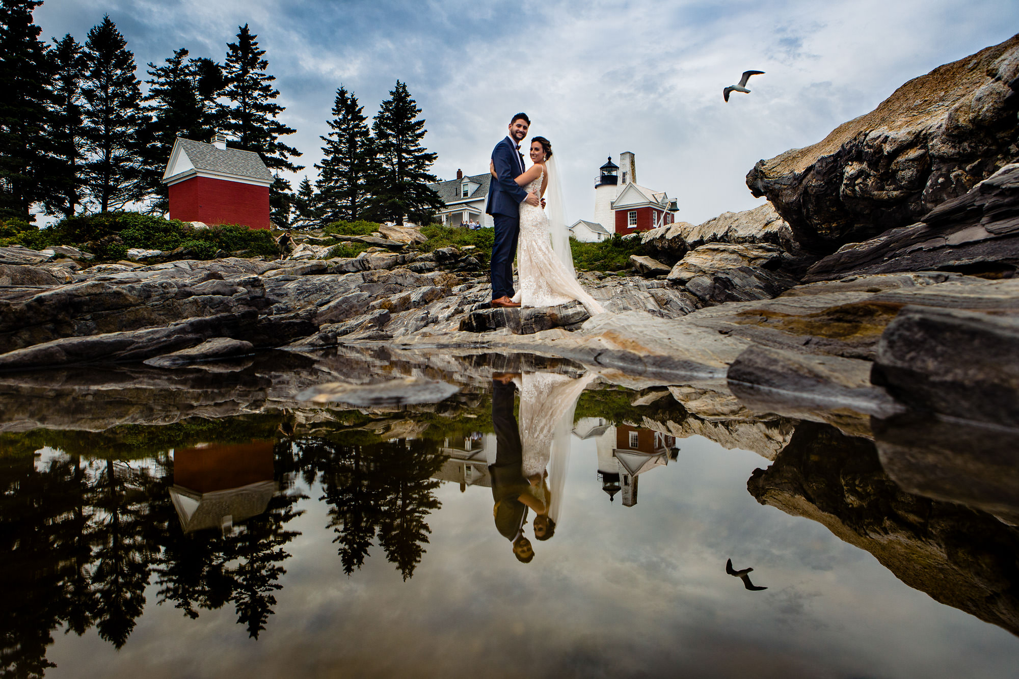 Creative wedding portraits at Pemaquid Point Lighthouse in Maine