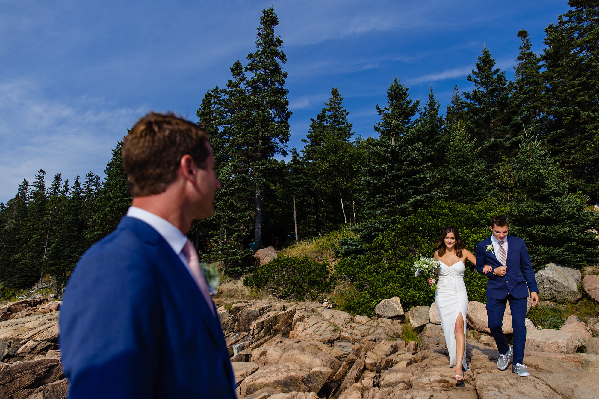 An elopement ceremony at Otter Point in Acadia National Park
