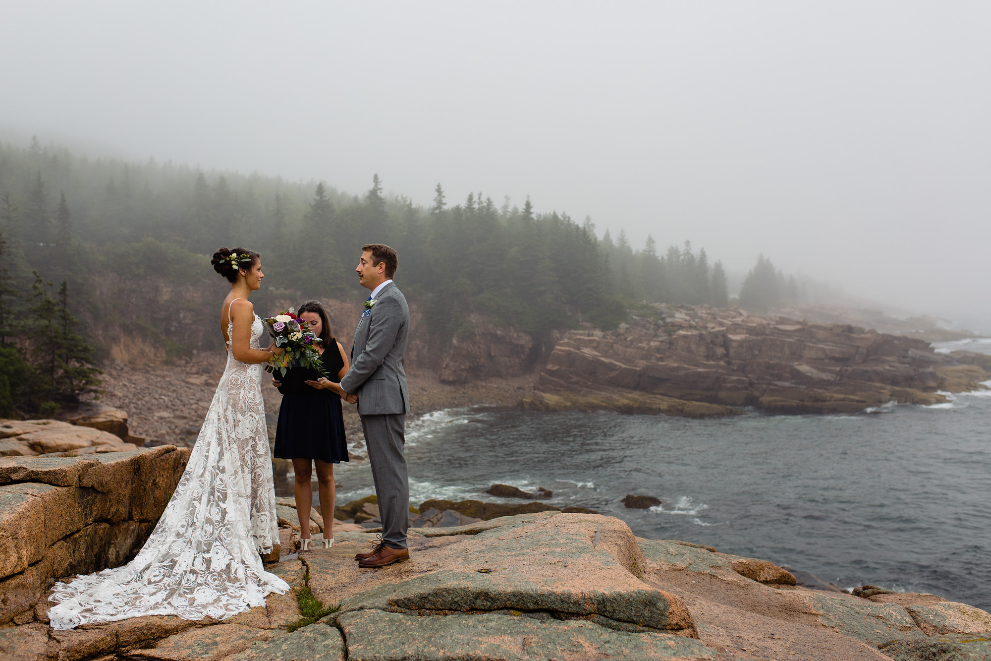 A beautiful foggy elopement at Monument cove at Acadia National Park