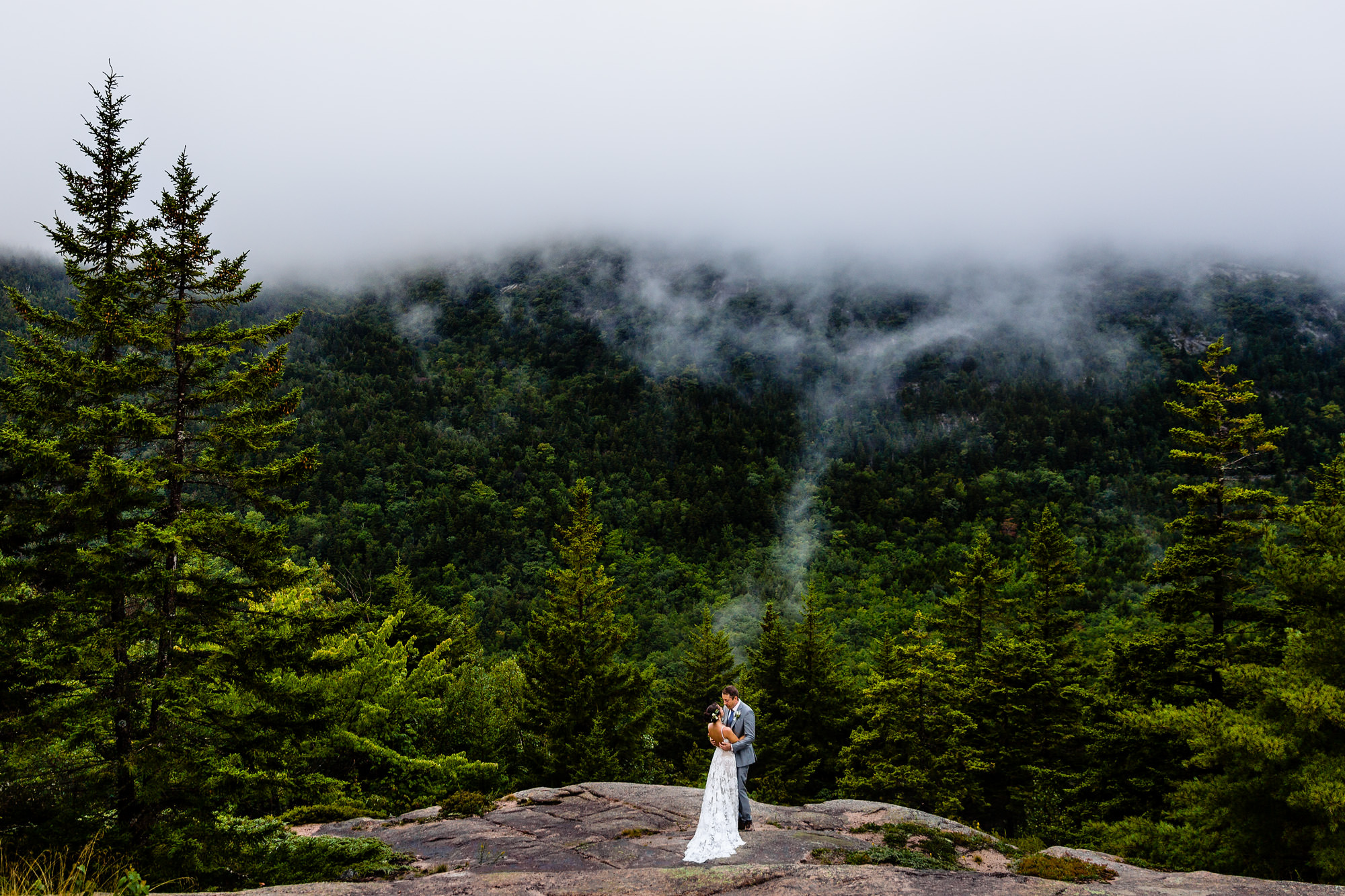 A dramatic portrait during a couples' elopement in Acadia National Park