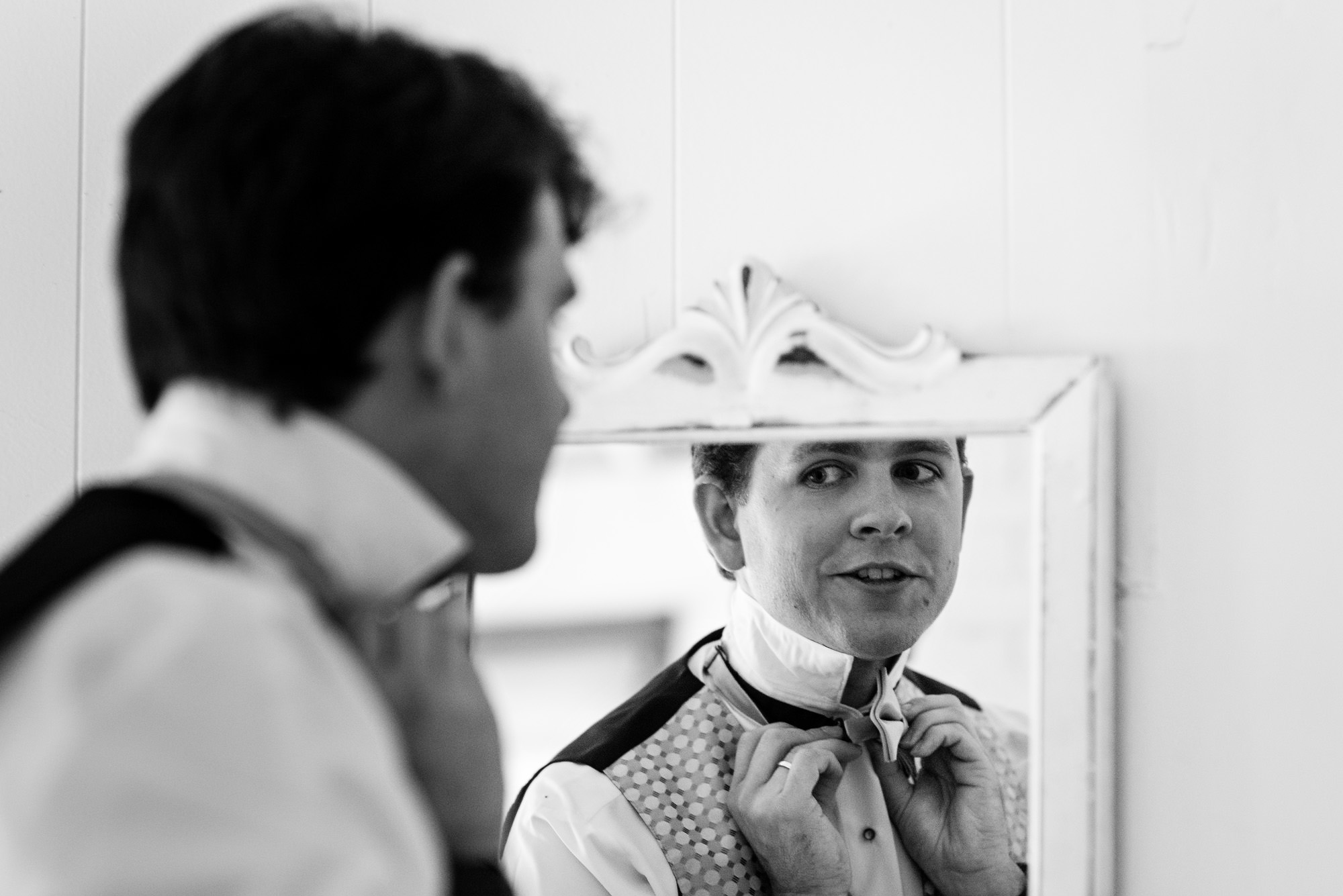 A groom prepares for his wedding day at the Bradley Inn in New Harbor, Maine