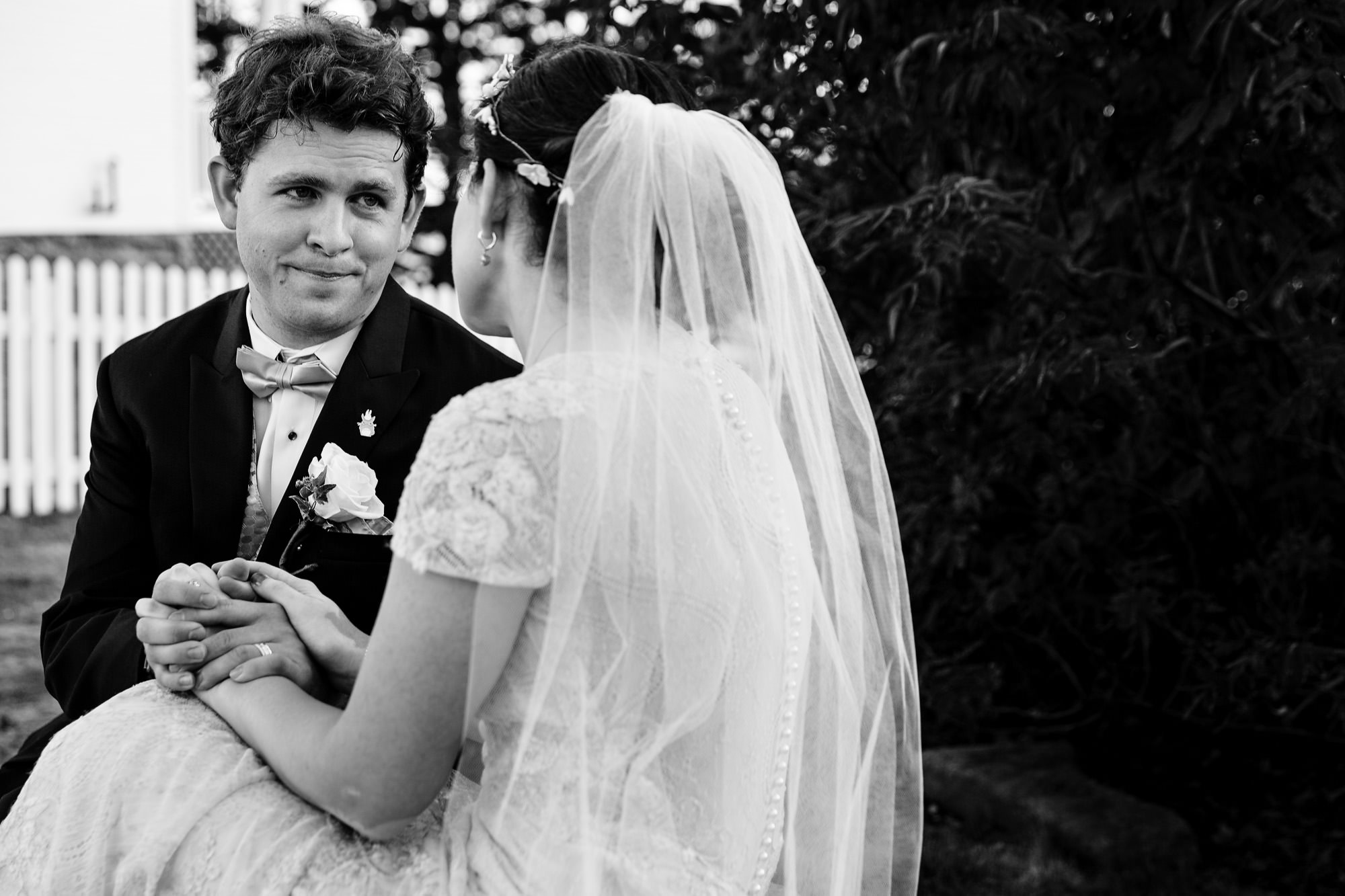 The bride and groom share a few minutes alone at their Bristol, Maine wedding