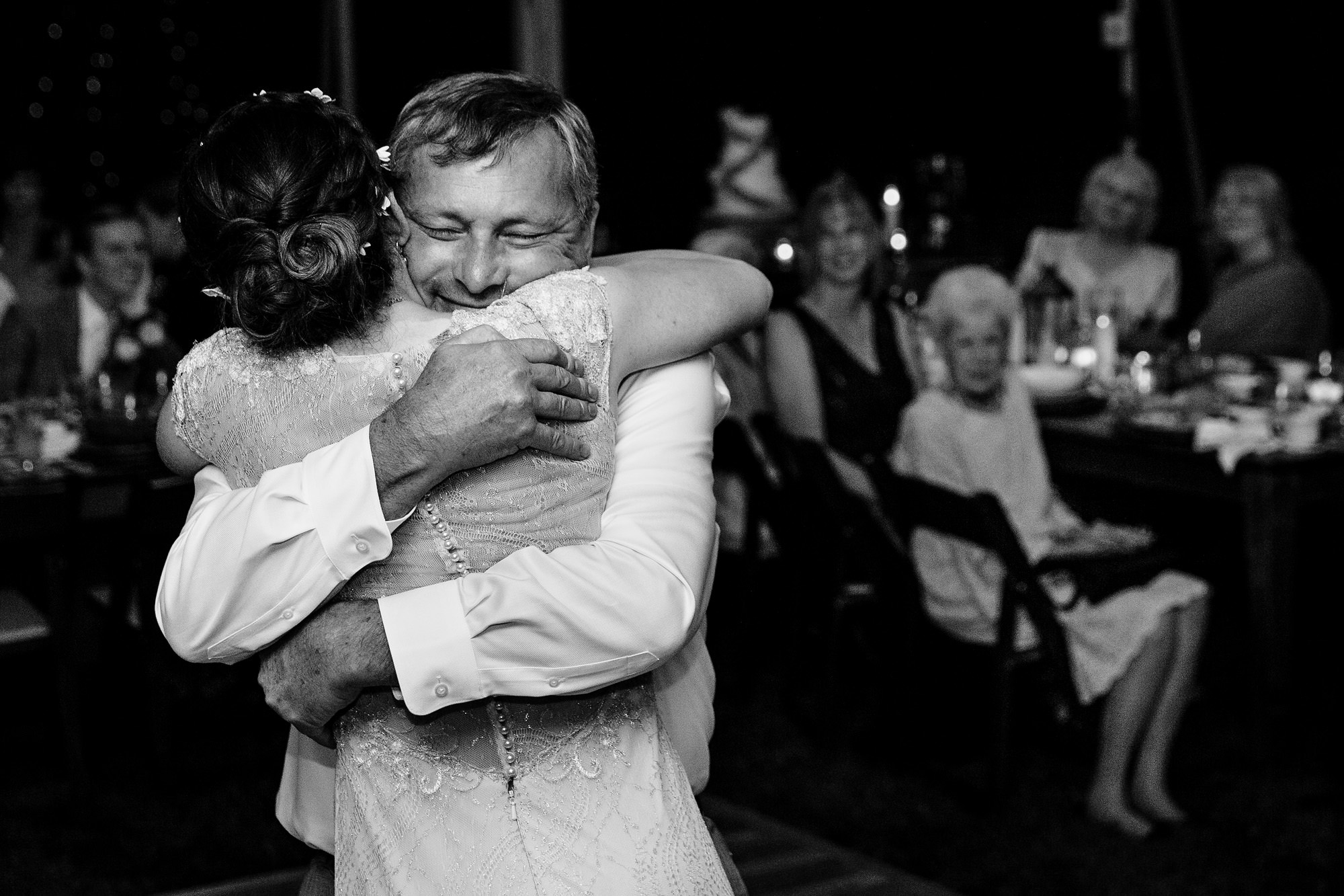 A father and daughter dance at a wedding in Midcoast Maine