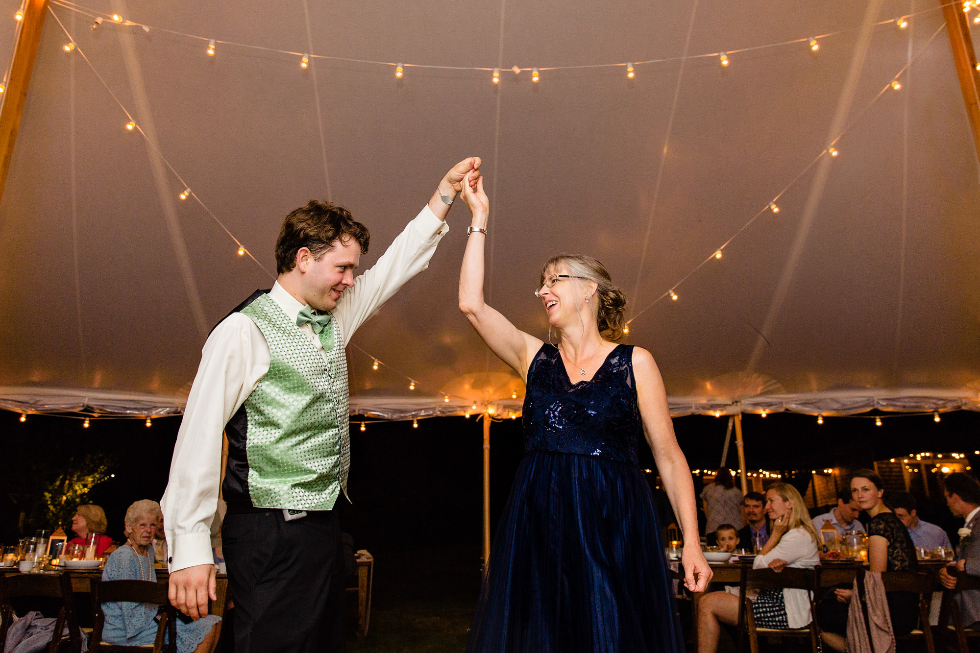 A mother and son dance at a wedding in New Harbor, Maine