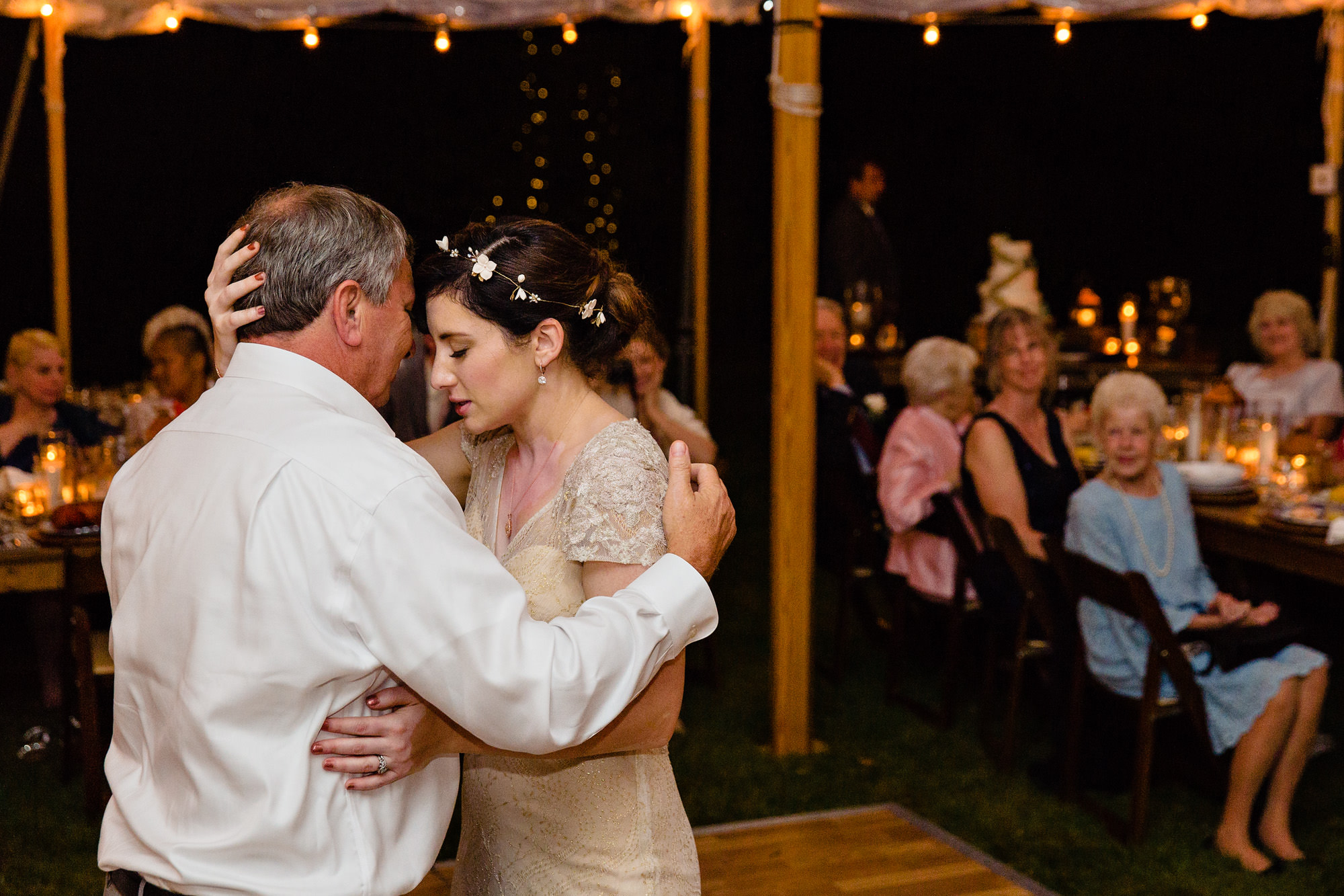 A father and daughter dance at a wedding in Midcoast Maine