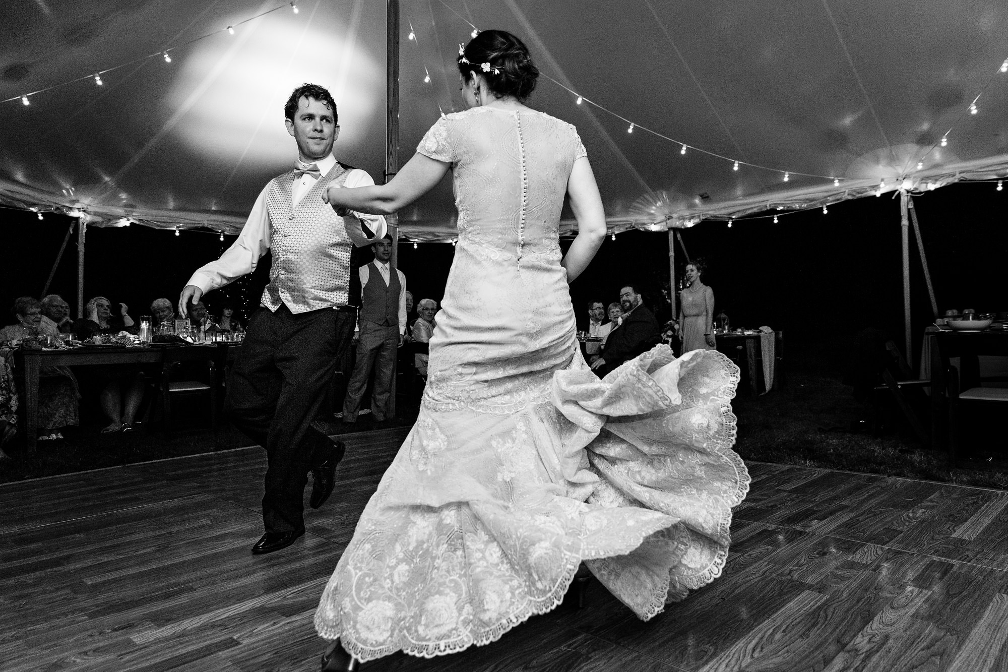 A fun and energetic dance floor at a Bradley Inn tented wedding in New Harbor, Maine