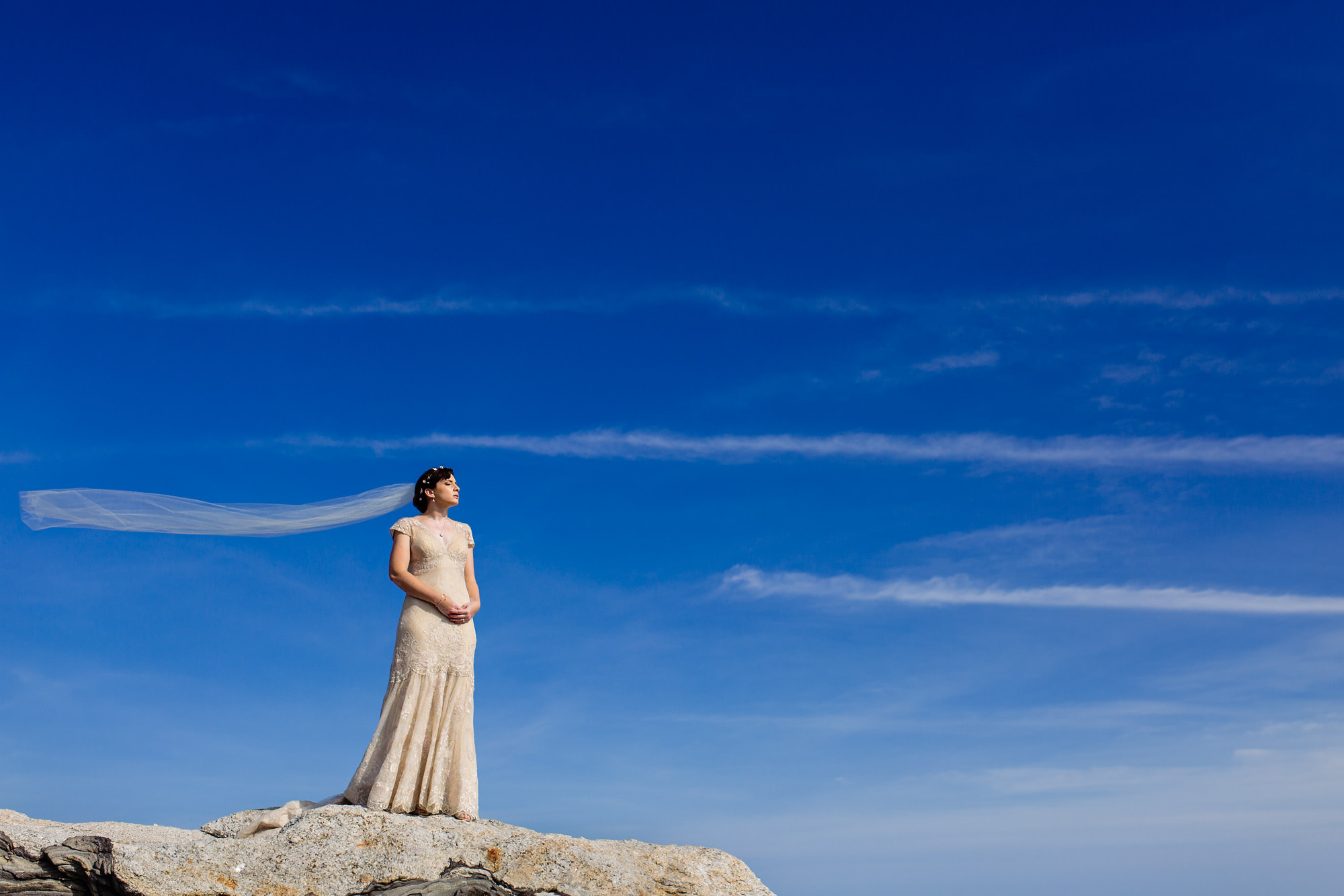 Beautiful wedding portraits at Pemaquid Point Lighthouse in Bristol, Maine