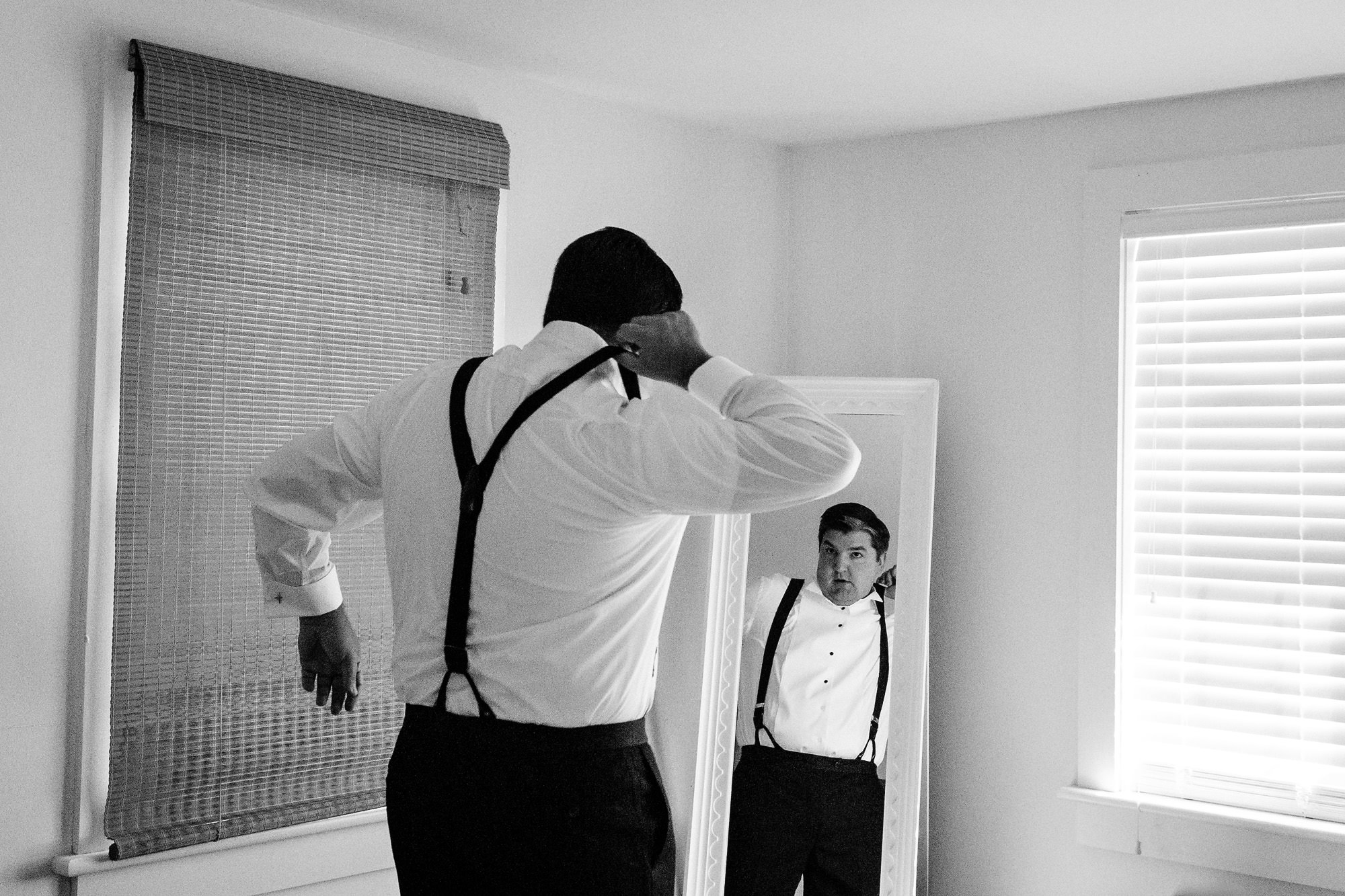 The groom prepares for his wedding at Newagen Seaside Inn in Southport, Maine