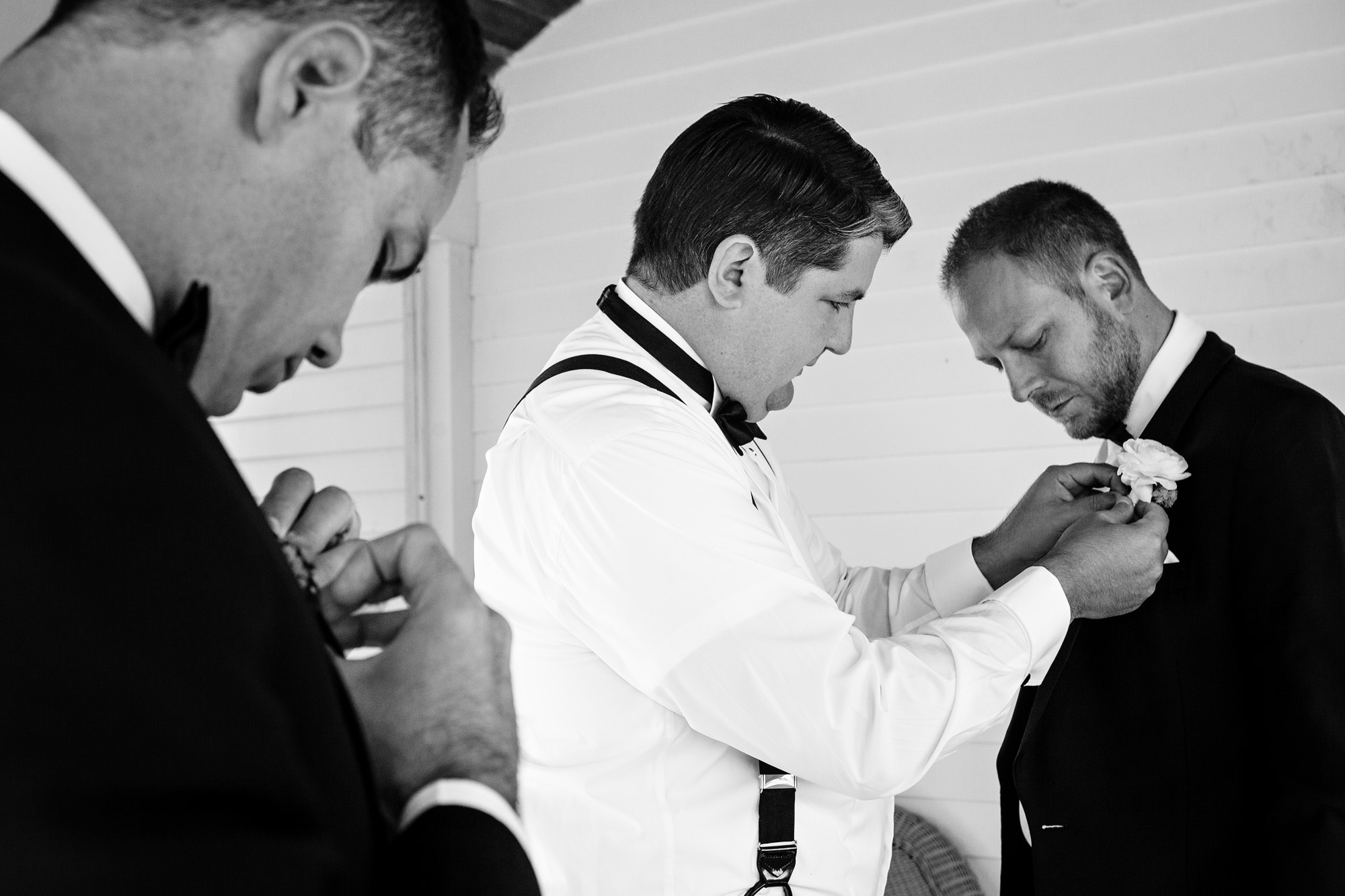 The groom prepares for his wedding at Newagen Seaside Inn in Southport, Maine