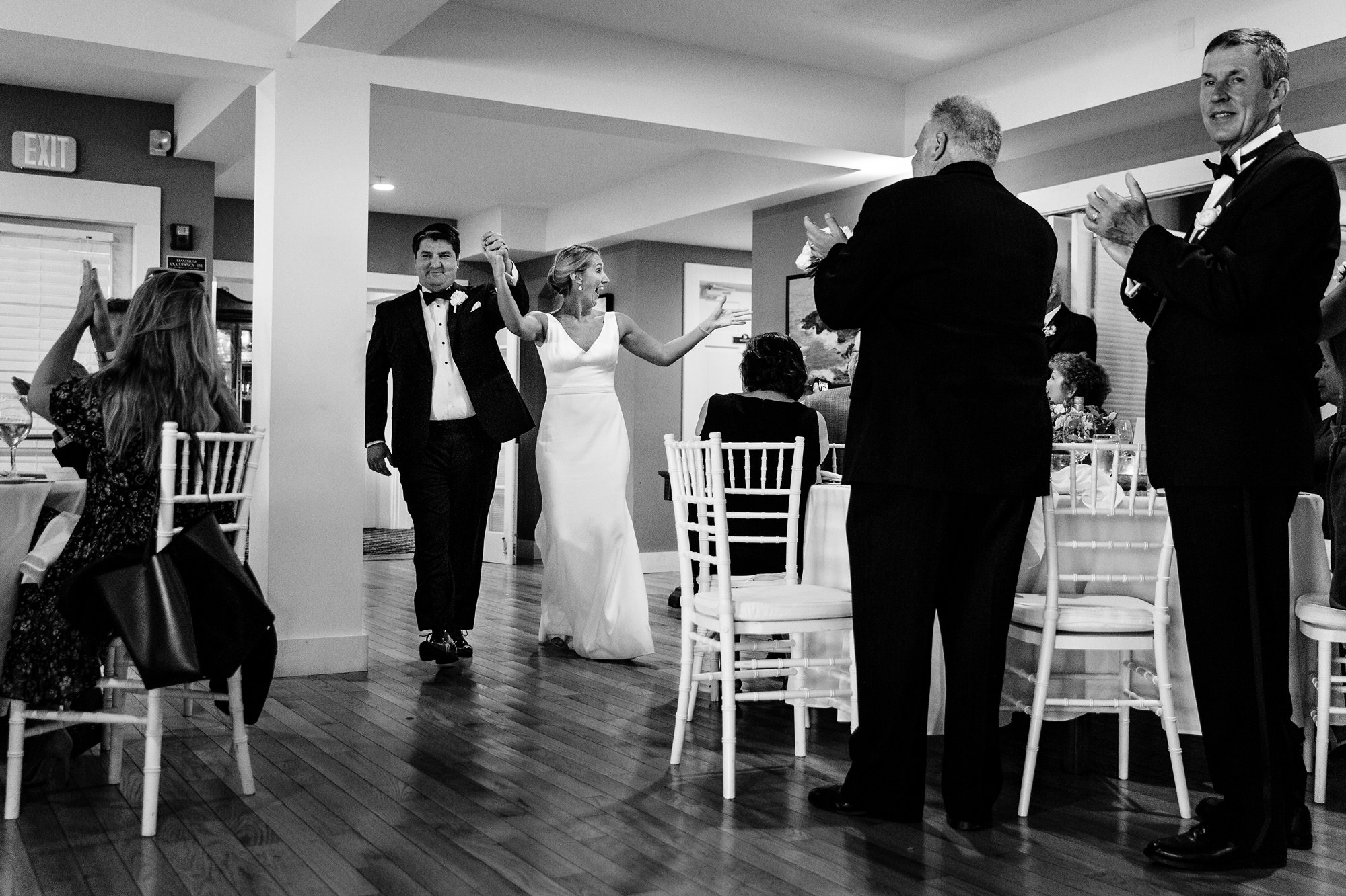 A bride and groom are introduced at their wedding at the Newagen Seaside Inn in Southport, Maine