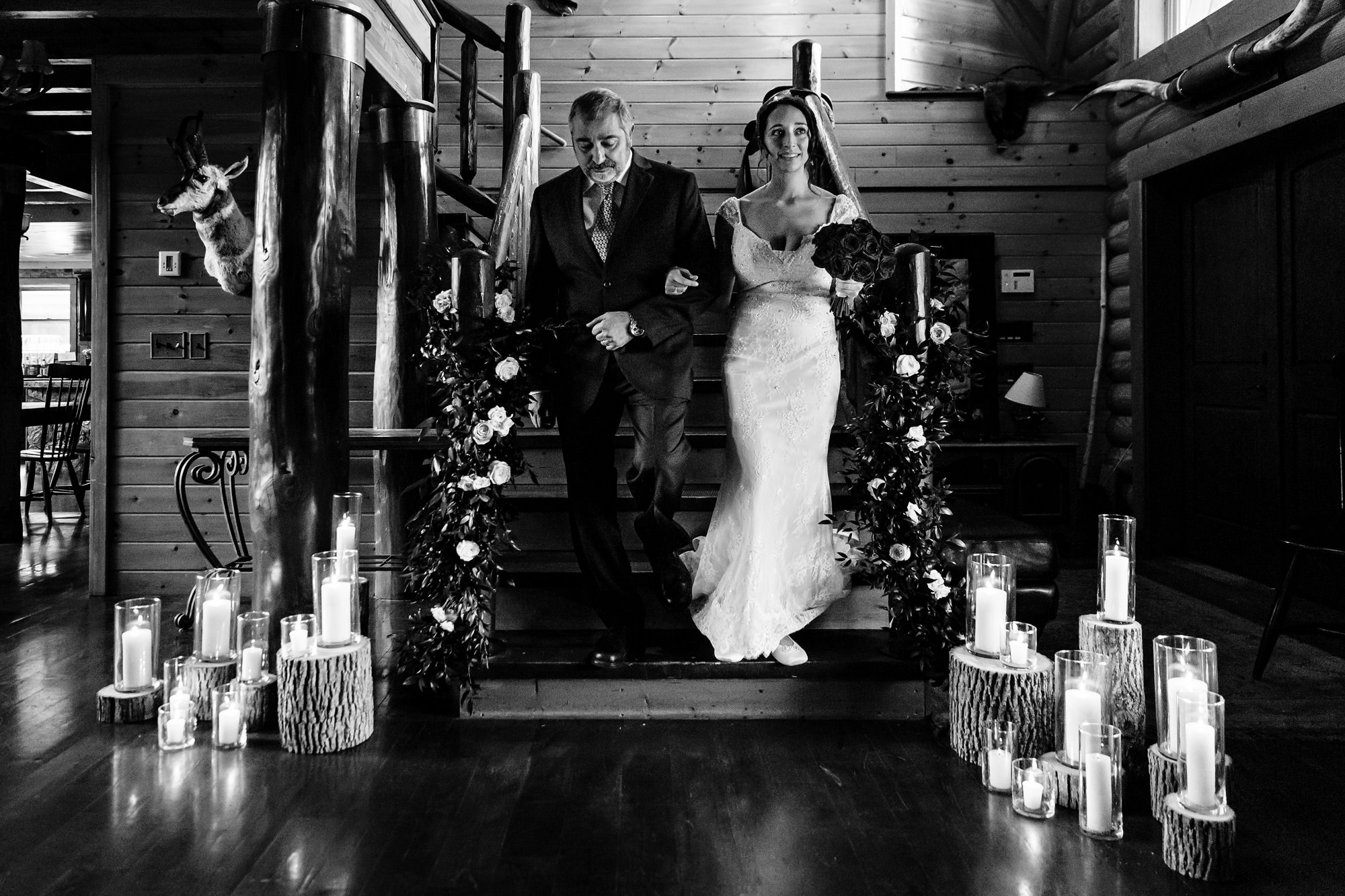 A bride and her father head toward the wedding ceremony in western Maine