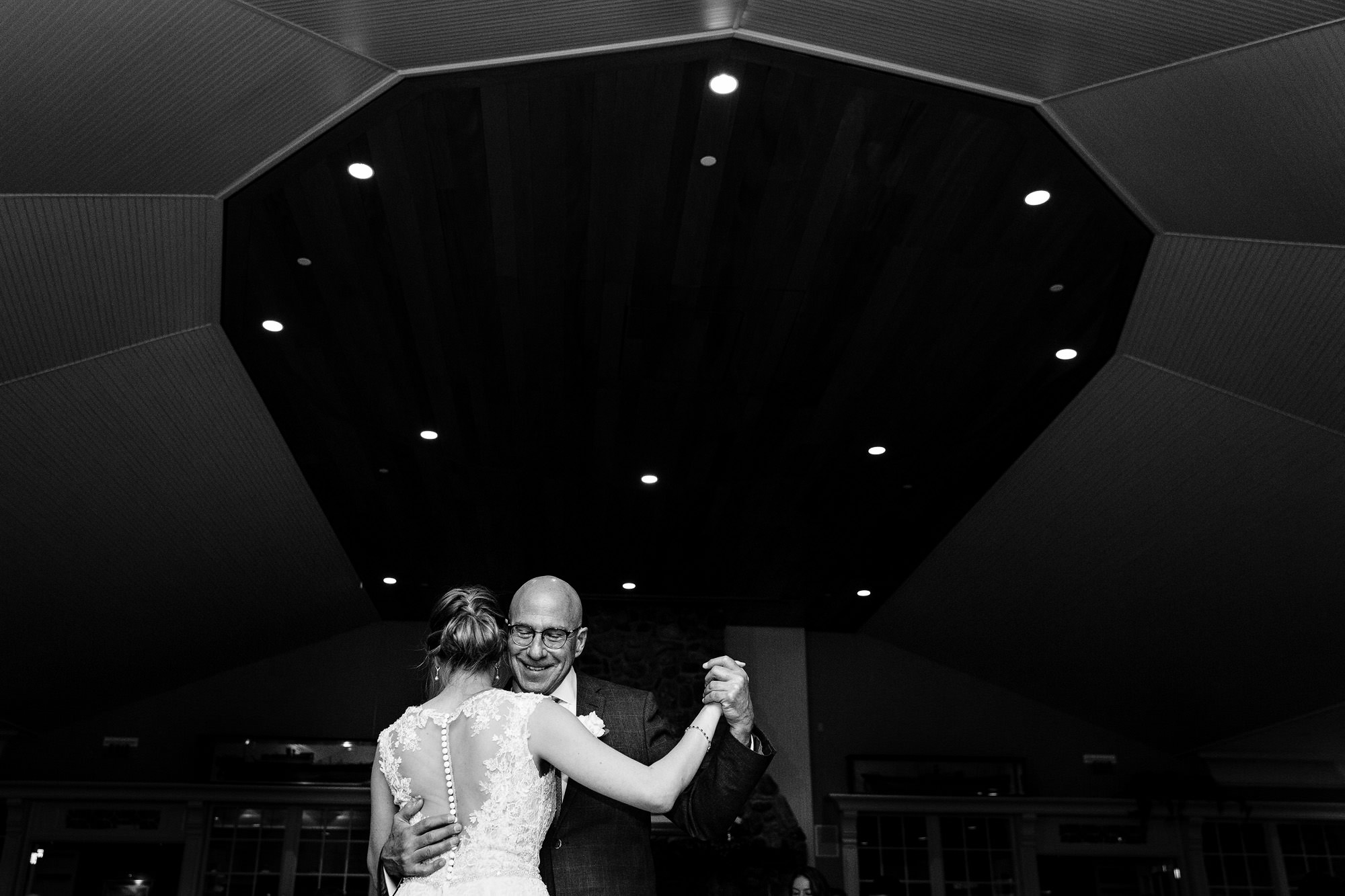 The bride dances with her father at her wedding at Point Lookout