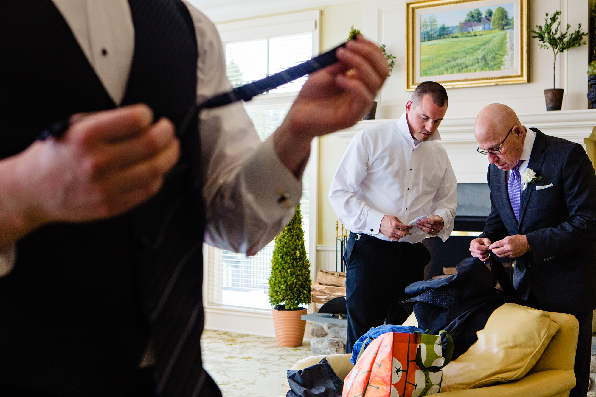 A groom prepares for his Point Lookout wedding in Maine.