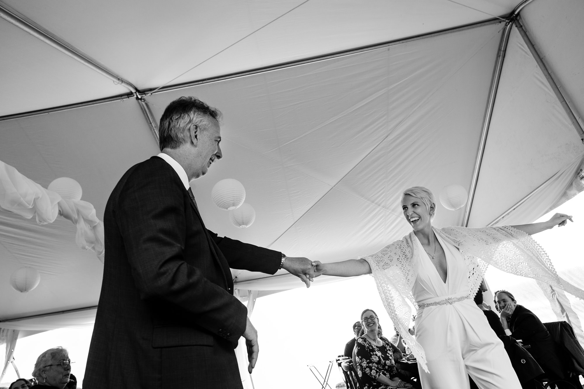 The bride shares a dance with her father at their wedding in Hancock Maine