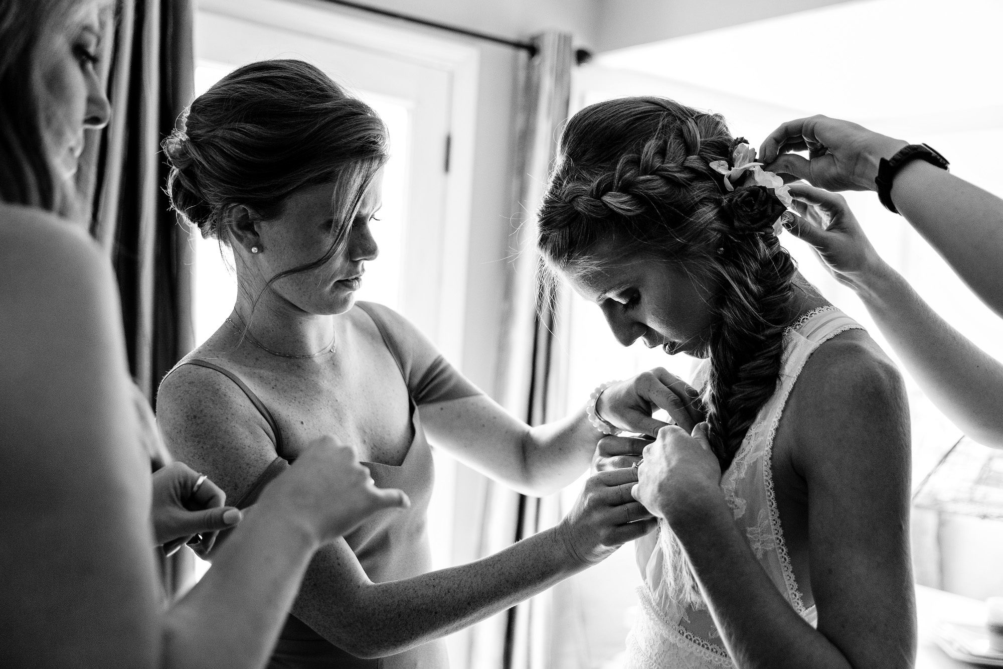 A bride prepares for her wedding day in Portland, Maine
