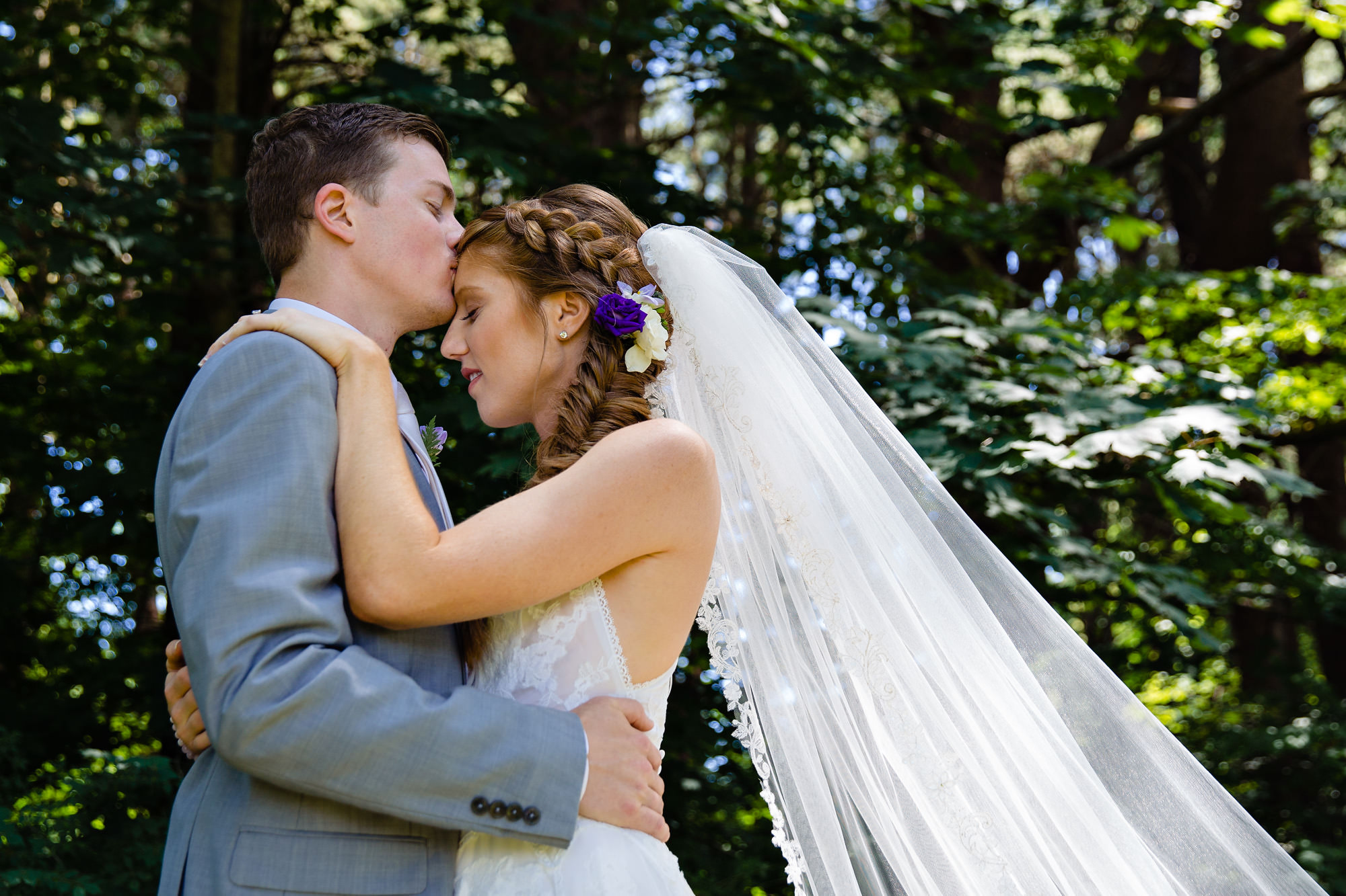 A bride and a groom share a first look on their Maine wedding day