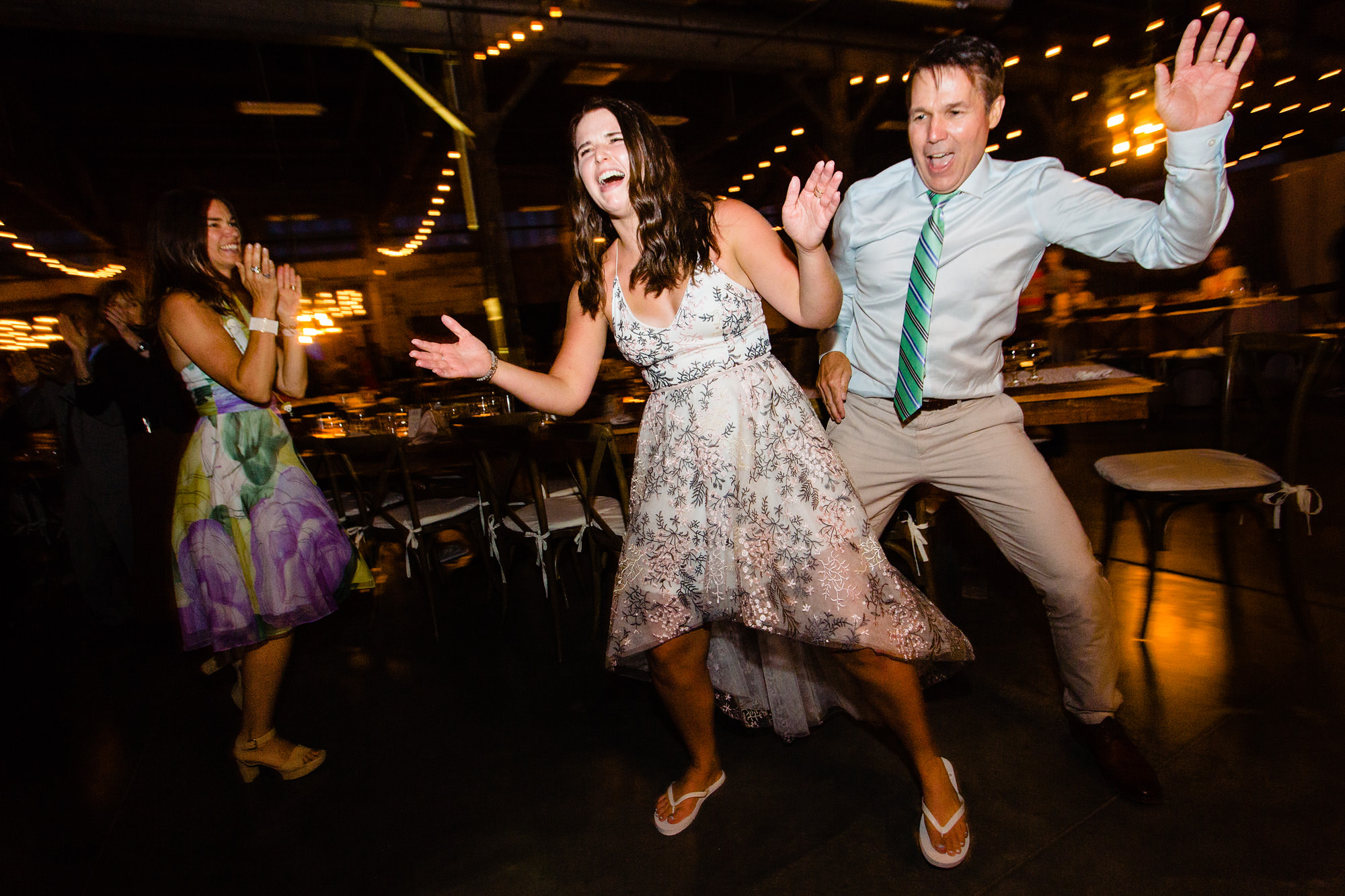 Candid photos of a dance floor at a Brick South wedding