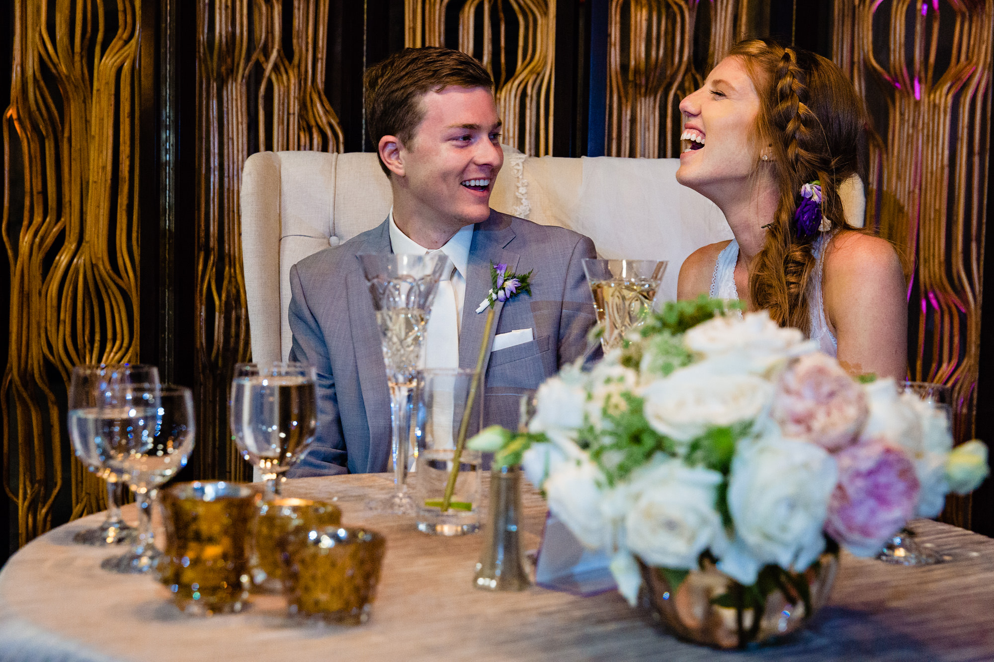 A couple laughs during a wedding at Brick South in Portland, Maine