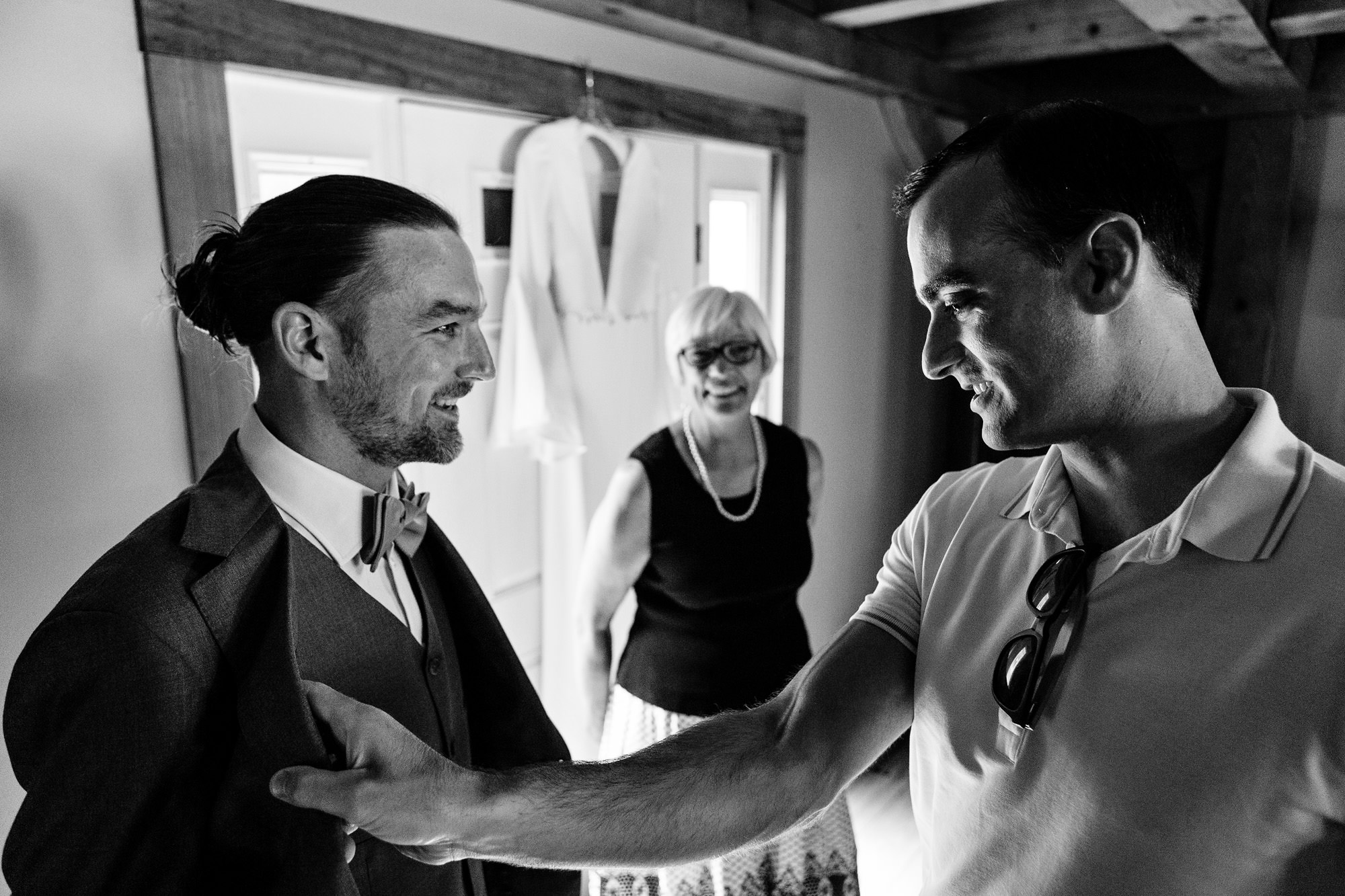 A groom gets ready for his wedding in western Maine.