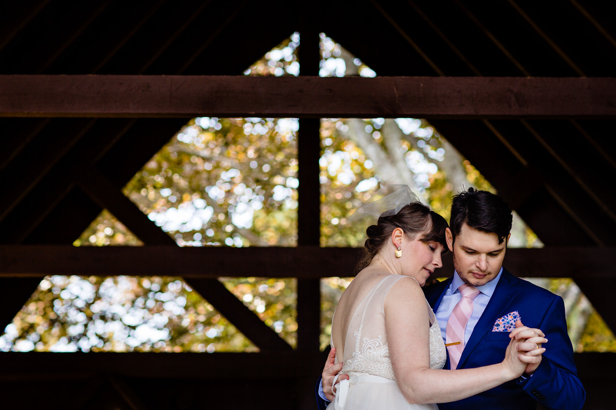 A bride and groom share a first dance at their elopement at the Vesper Hill Children's Chapel in Maine