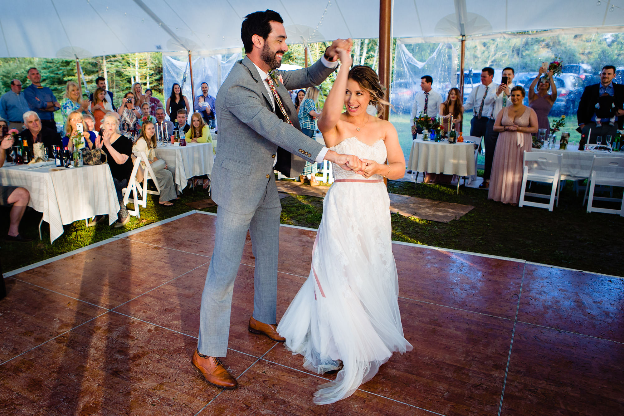 The bride and groom do a first dance at a midcoast Maine wedding