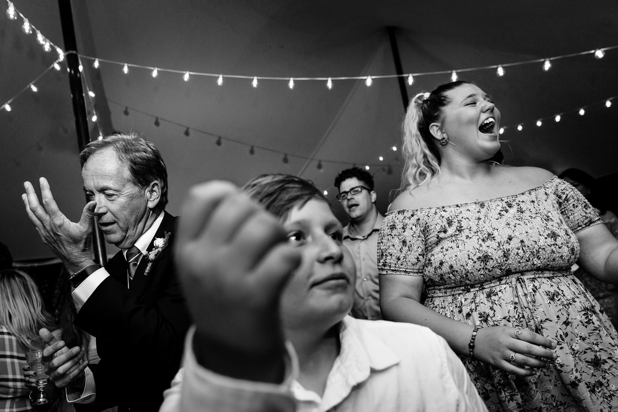 Candid dancing photos at a private residence Lamoine Maine wedding