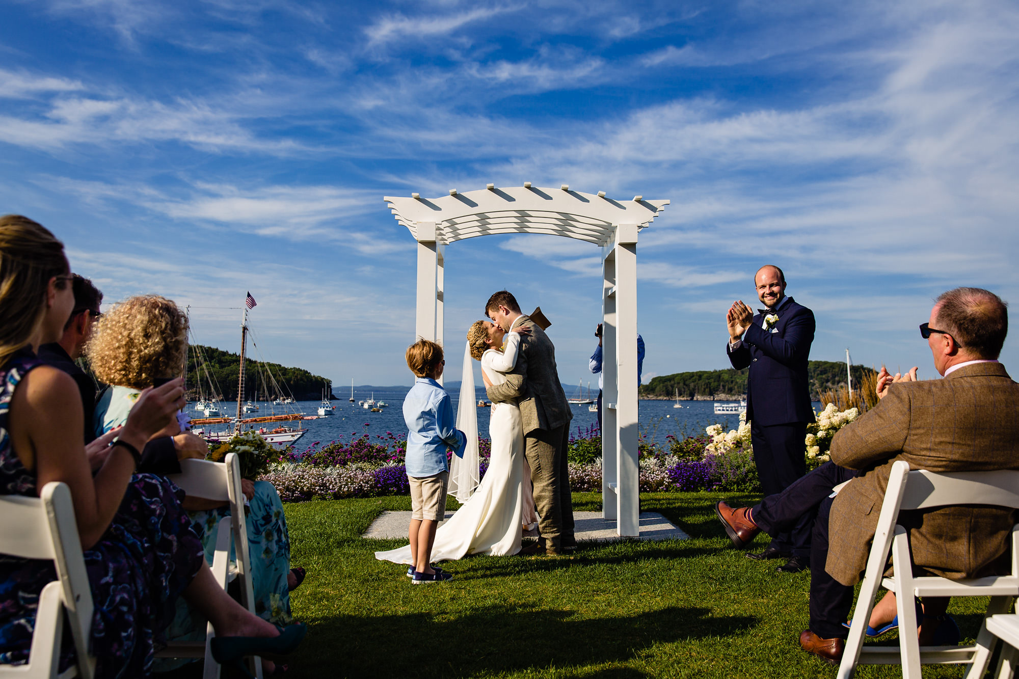 A first kiss in front of the Bar Harbor inn on MDI in Maine