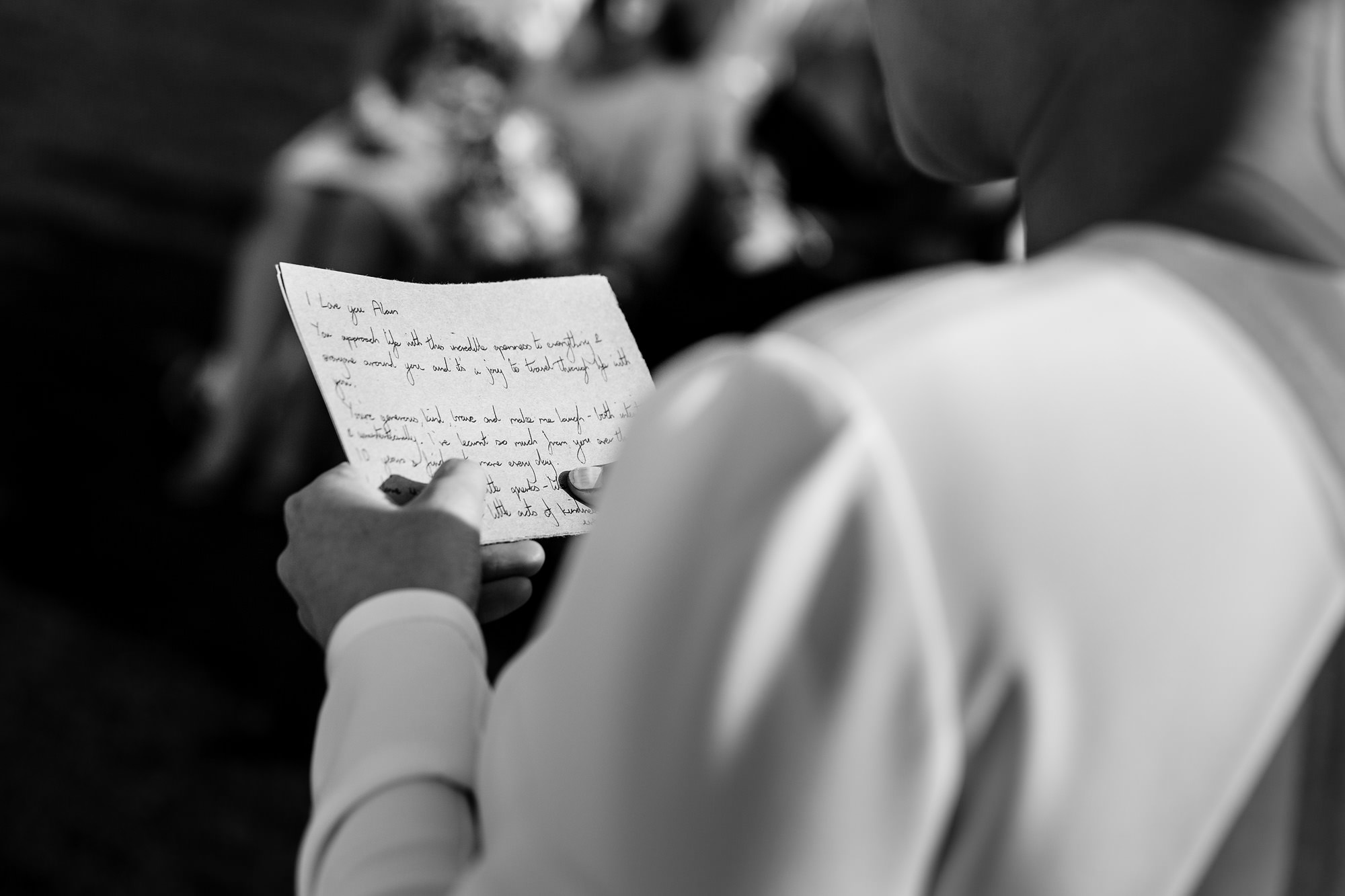 The bride's vows written out in beautiful handwriting.