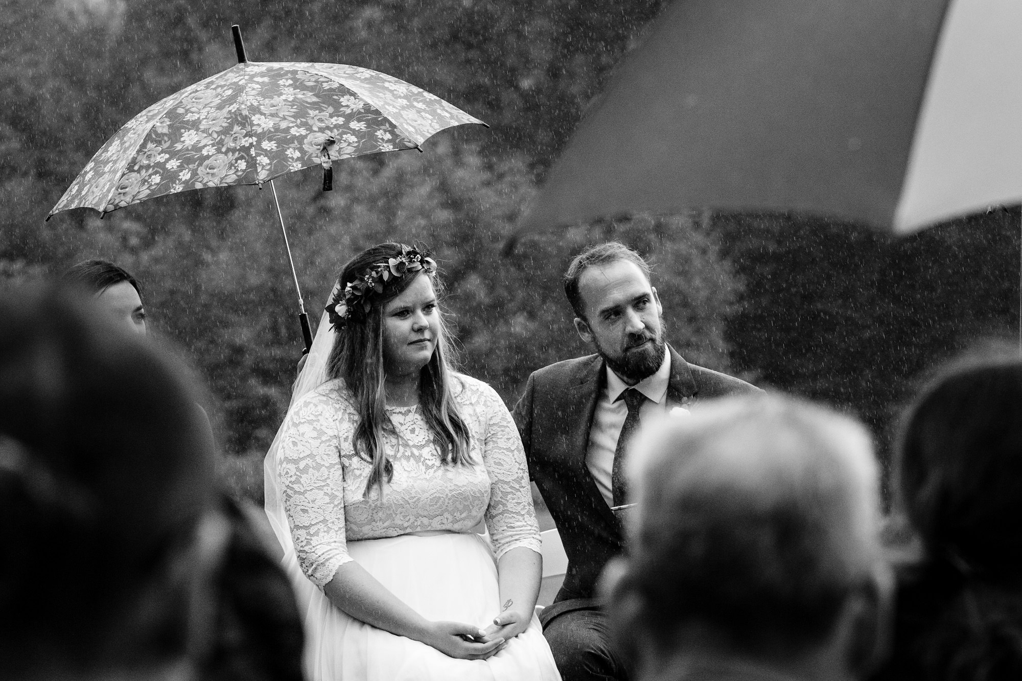 A rainy wedding ceremony at Sugarloaf Mountain in Maine