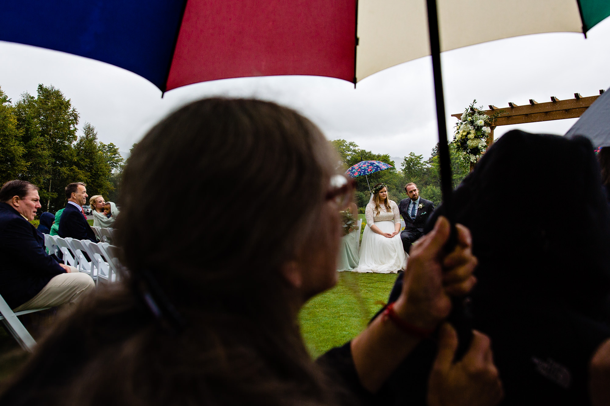 A rainy wedding ceremony at Sugarloaf Mountain in Maine
