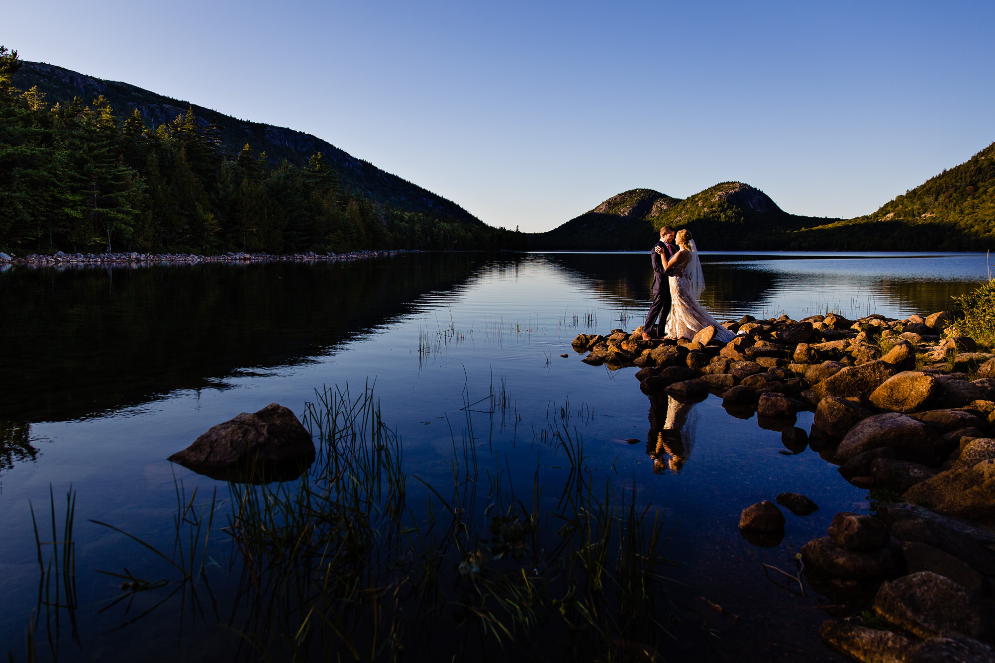 A beautiful wedding portrait taken at Jordan Pond during an elopement in Acadia