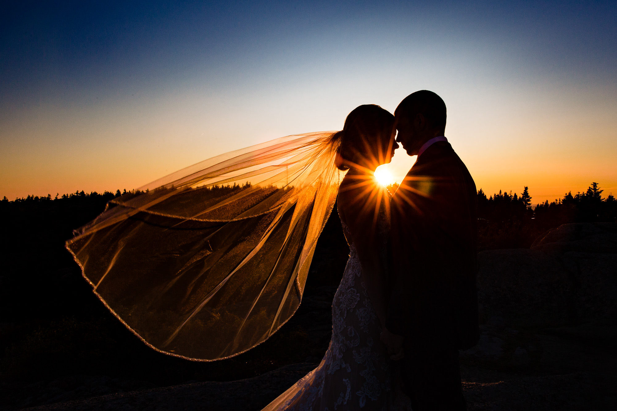Sunset portraits taken at an elopement on Cadillac Mountain in Acadia National Park