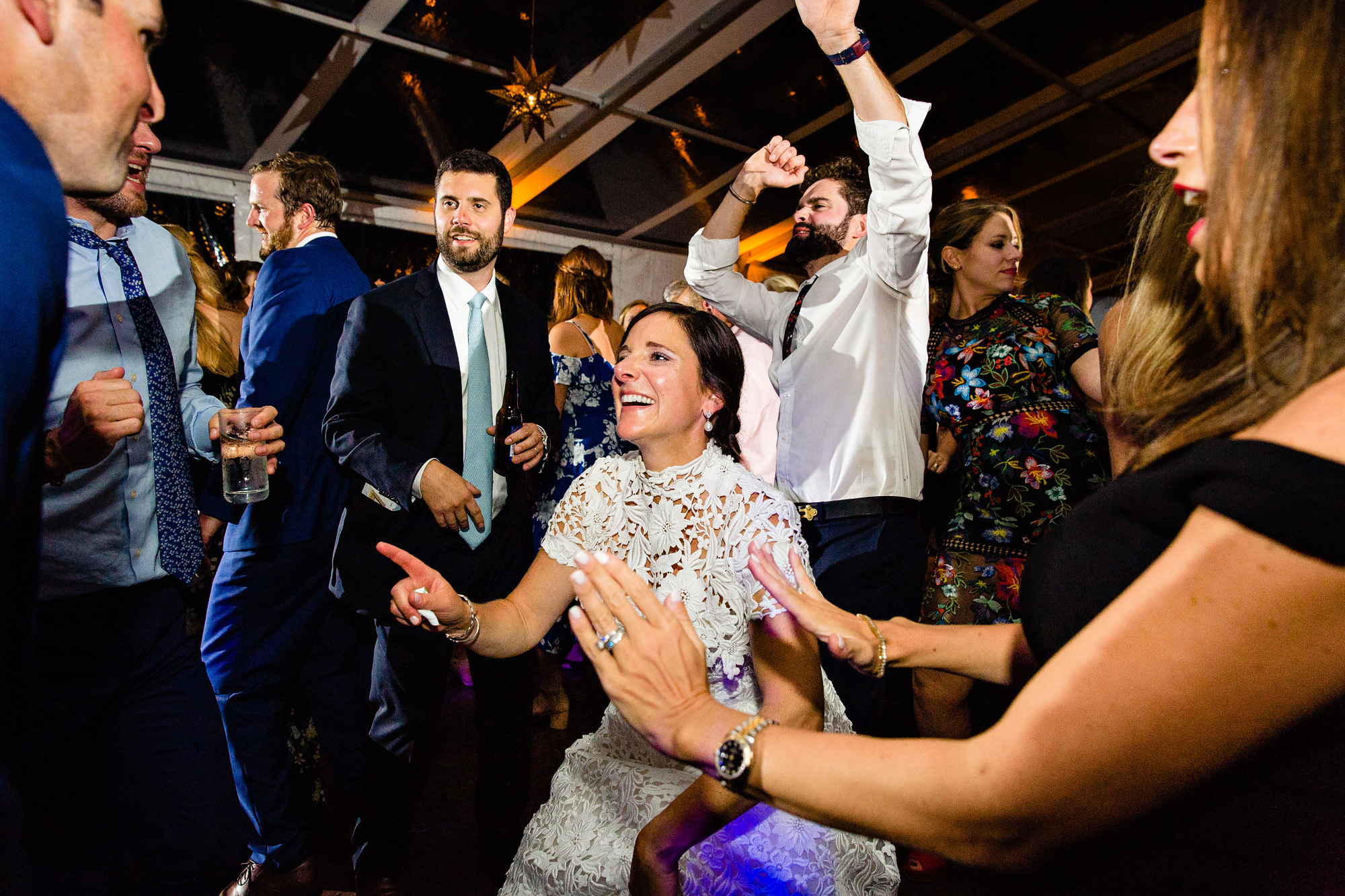 A joyful dance floor at a Blue Hill Country Club wedding