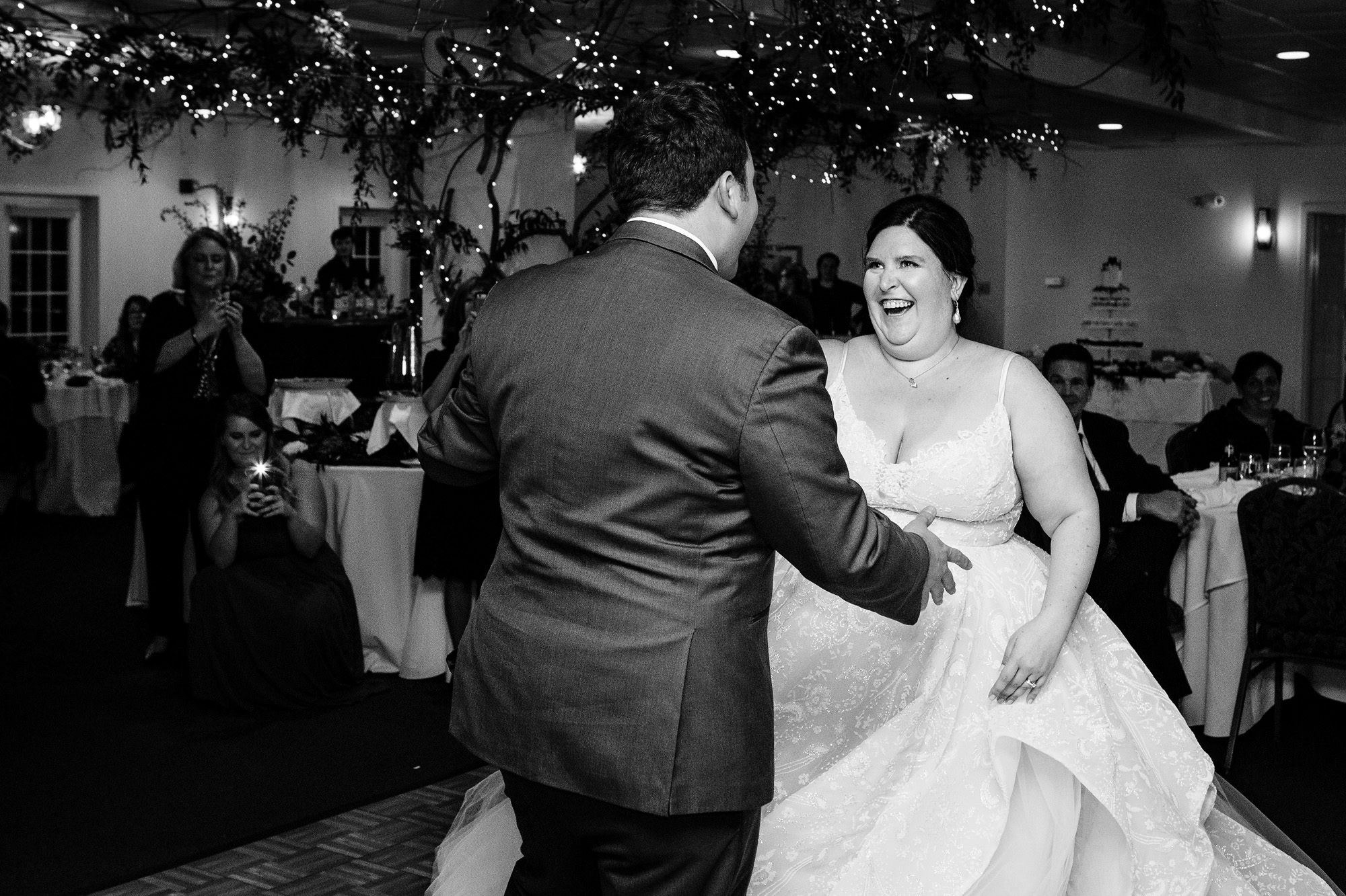 The bride and groom dance at their Freeport Maine wedding