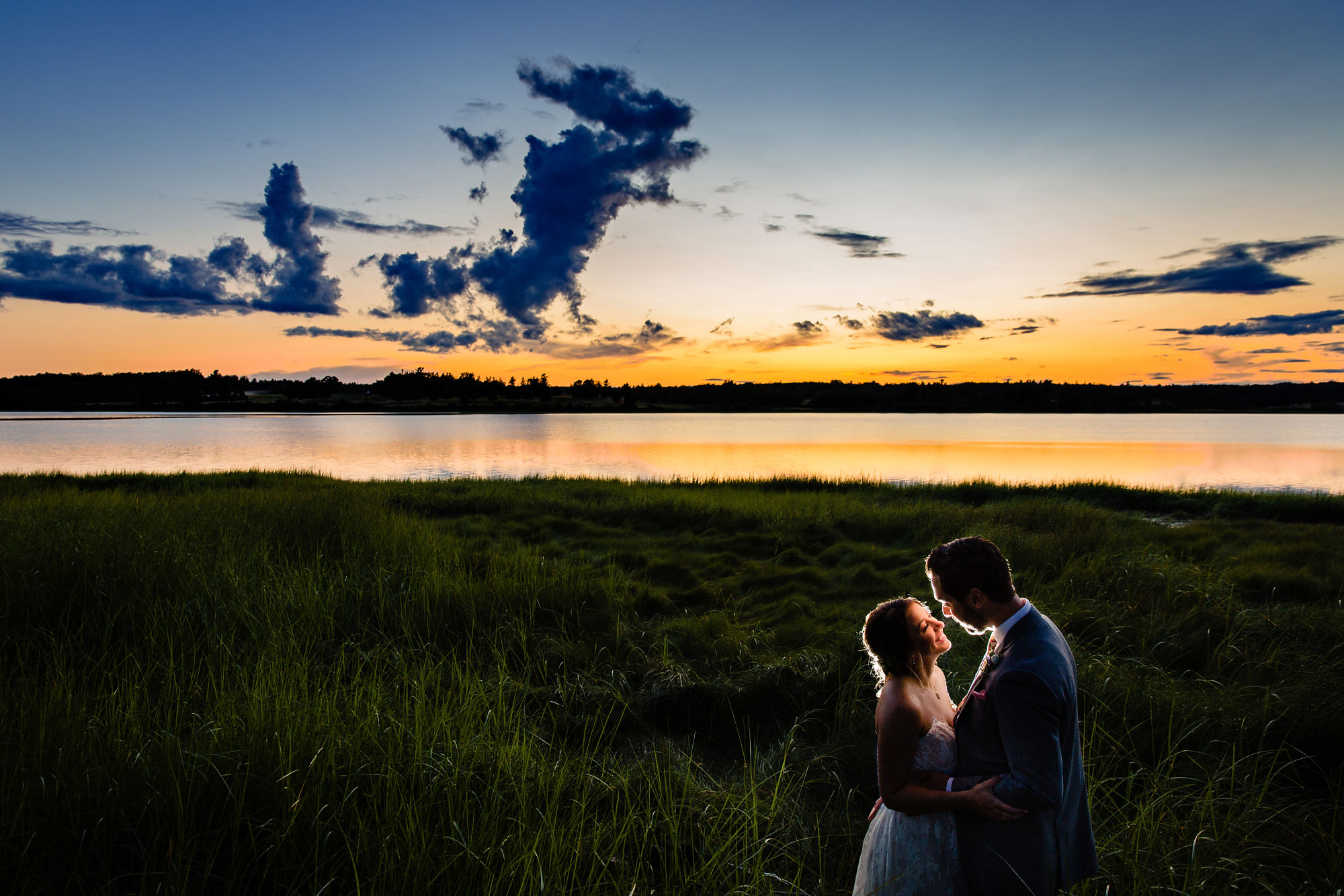 Dramatic Maine wedding sunset portrait