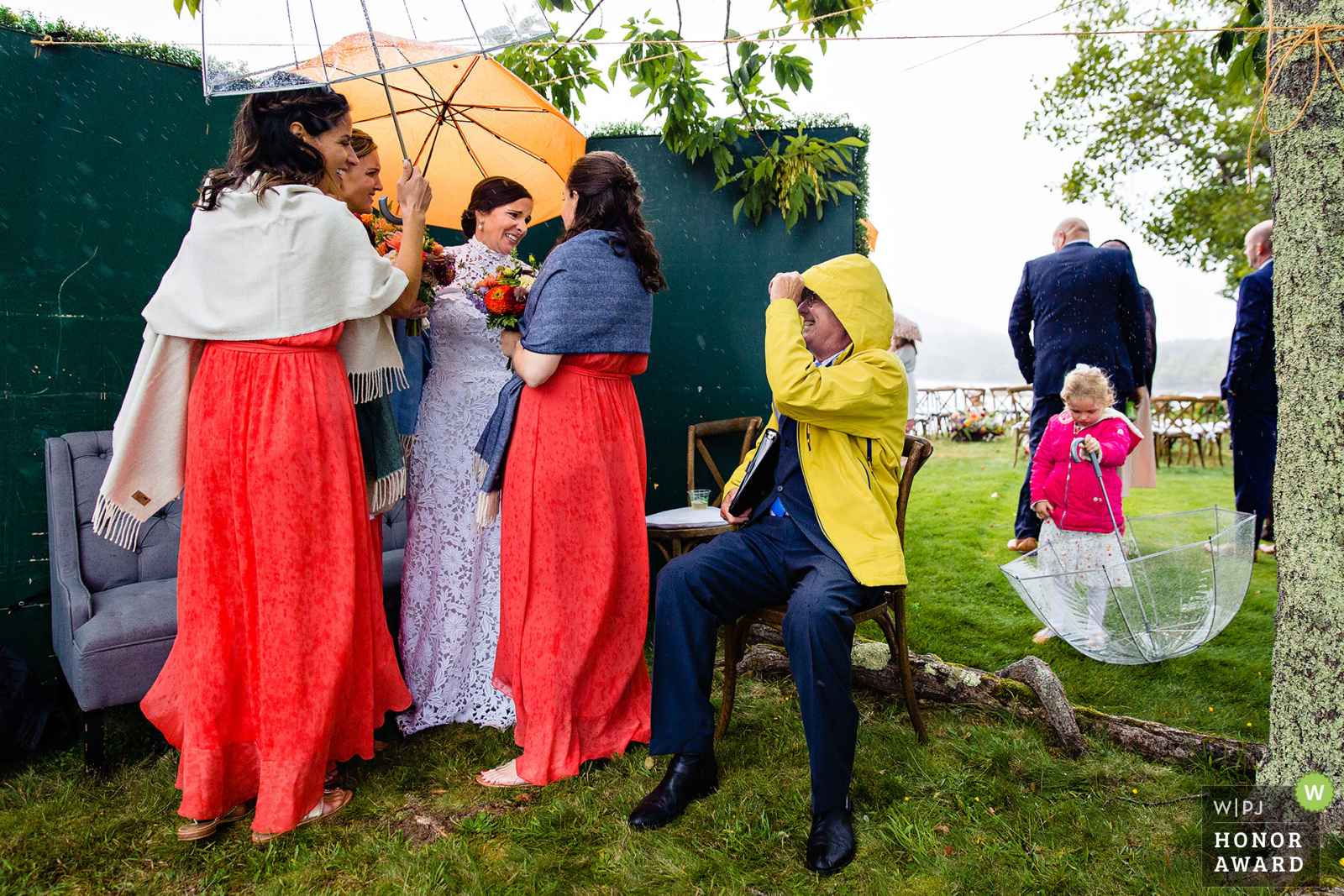 Everyone reacts to the rain at a Blue Hill Maine wedding
