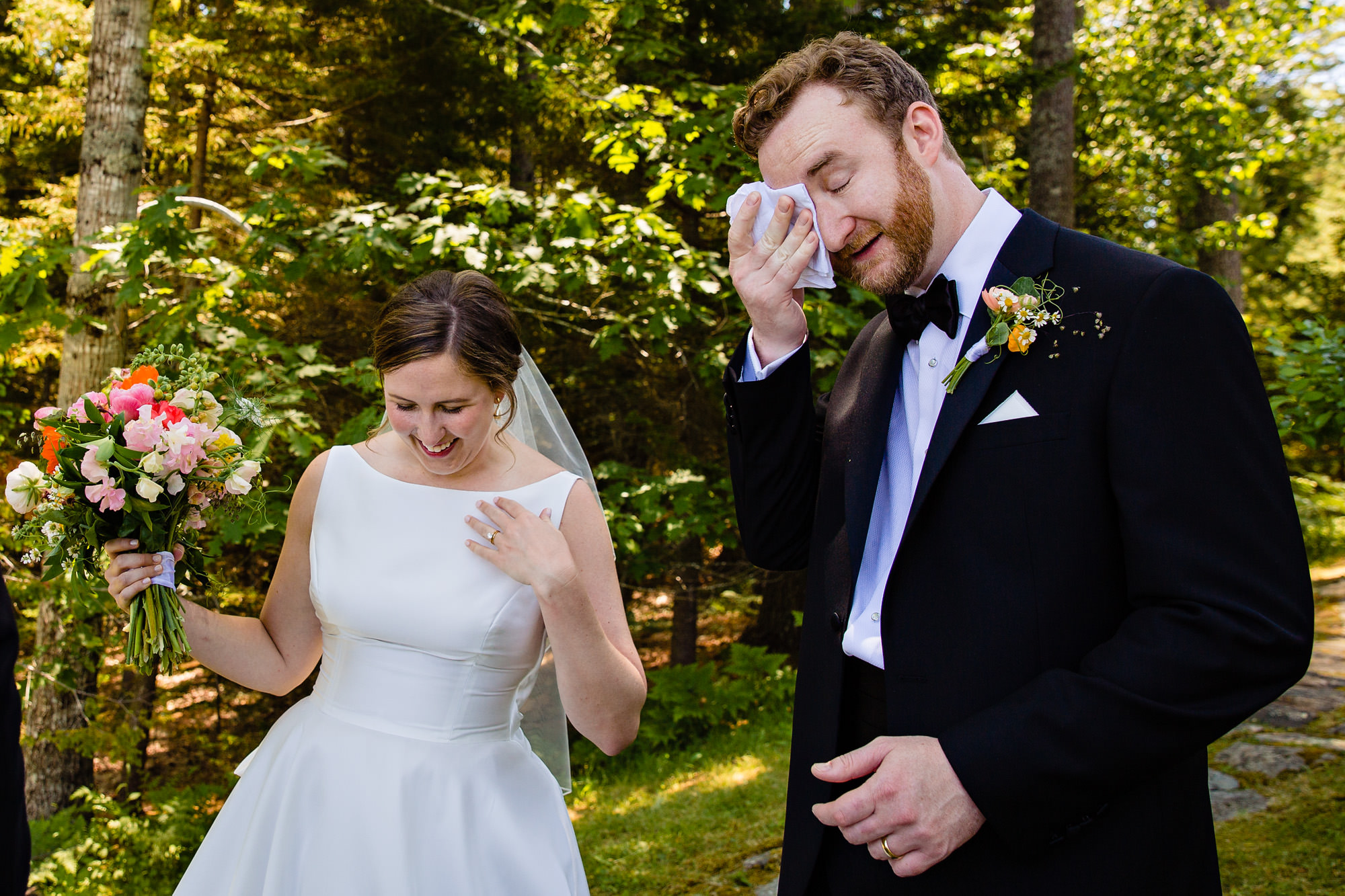 The bride and groom immediately after their wedding ceremony in Maine