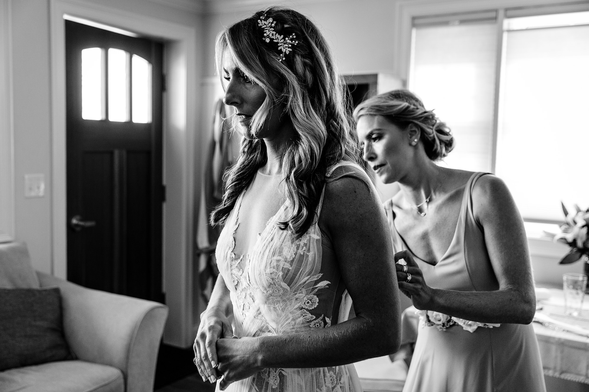 A bride gets dressed for her southern Maine wedding