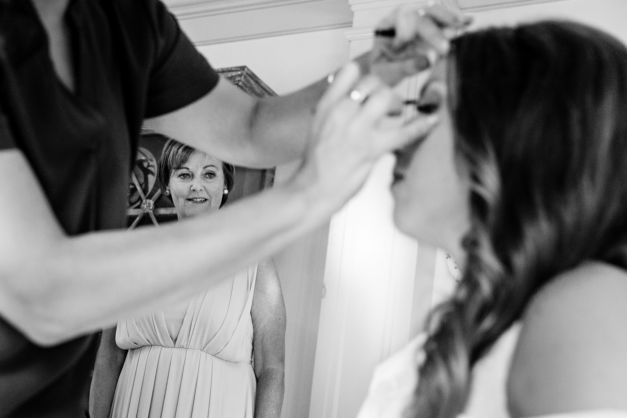 The bride gets ready at her Barn at Flanagan Farm wedding in Buxton, Maine