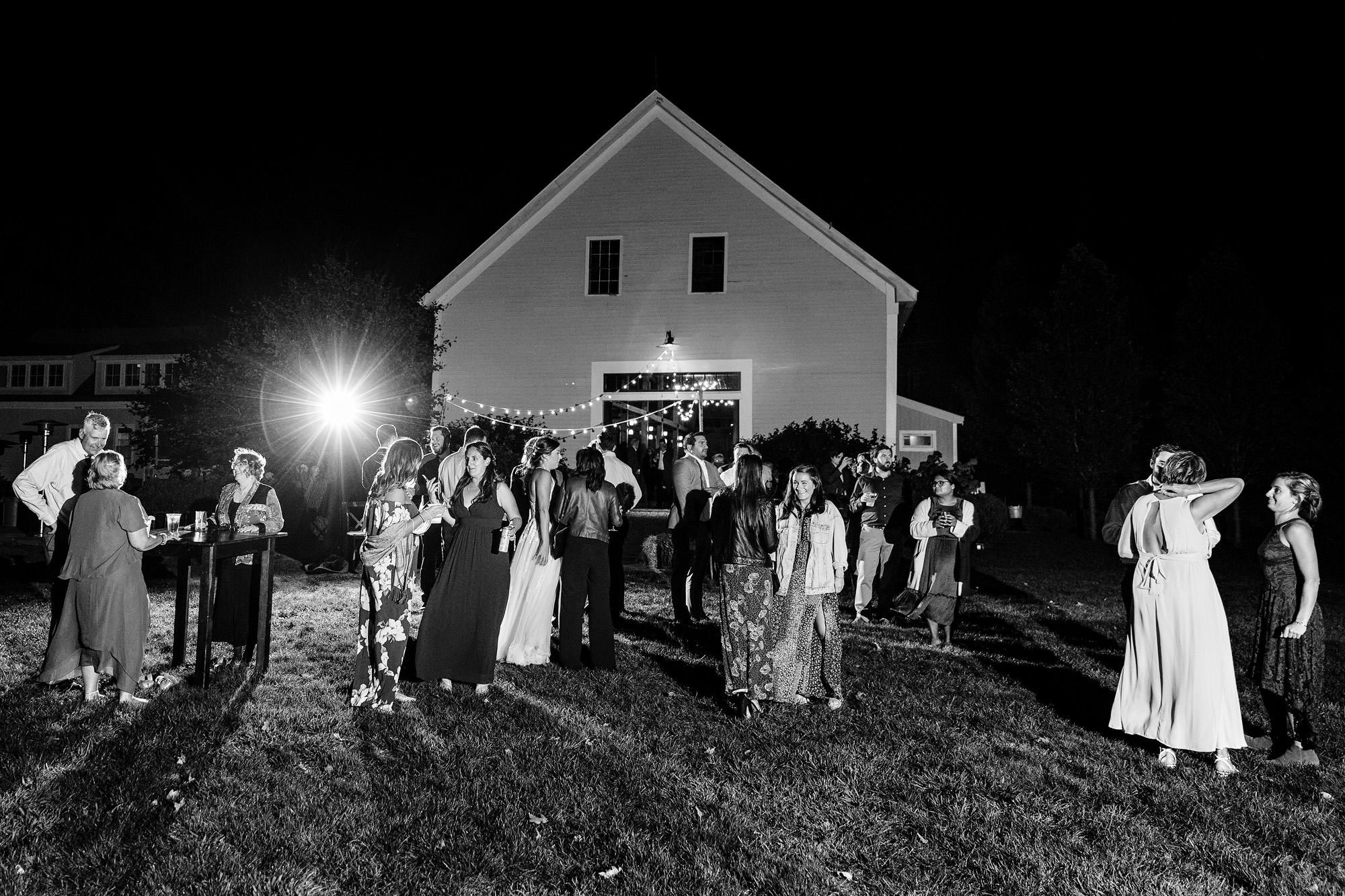 An outside wedding reception at the Barn at Flanagan Farm in Buxton, Maine