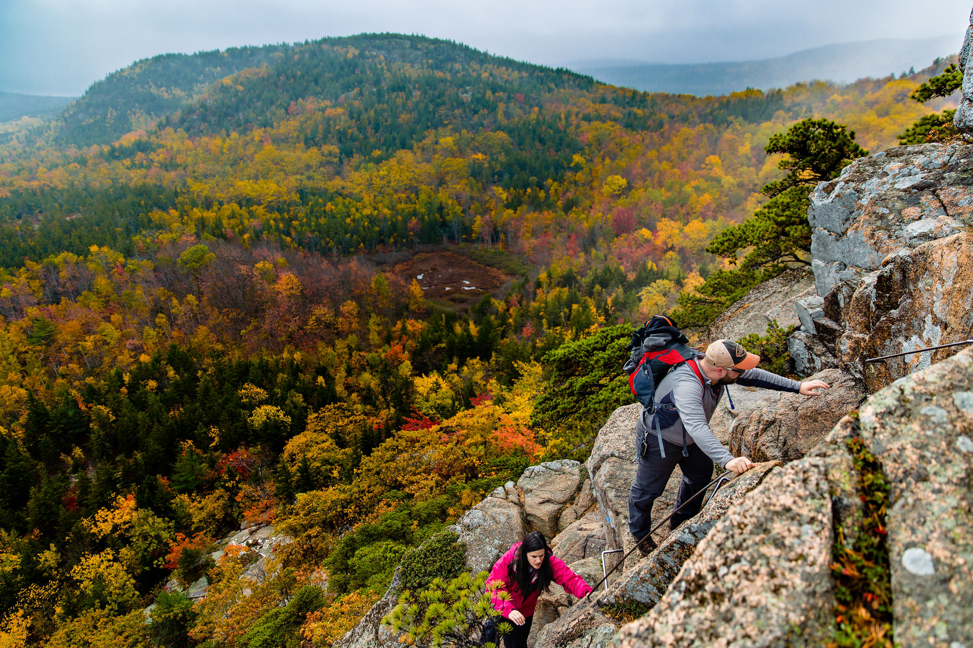 A couple hikes Beehive in the fall in Acadia National Park