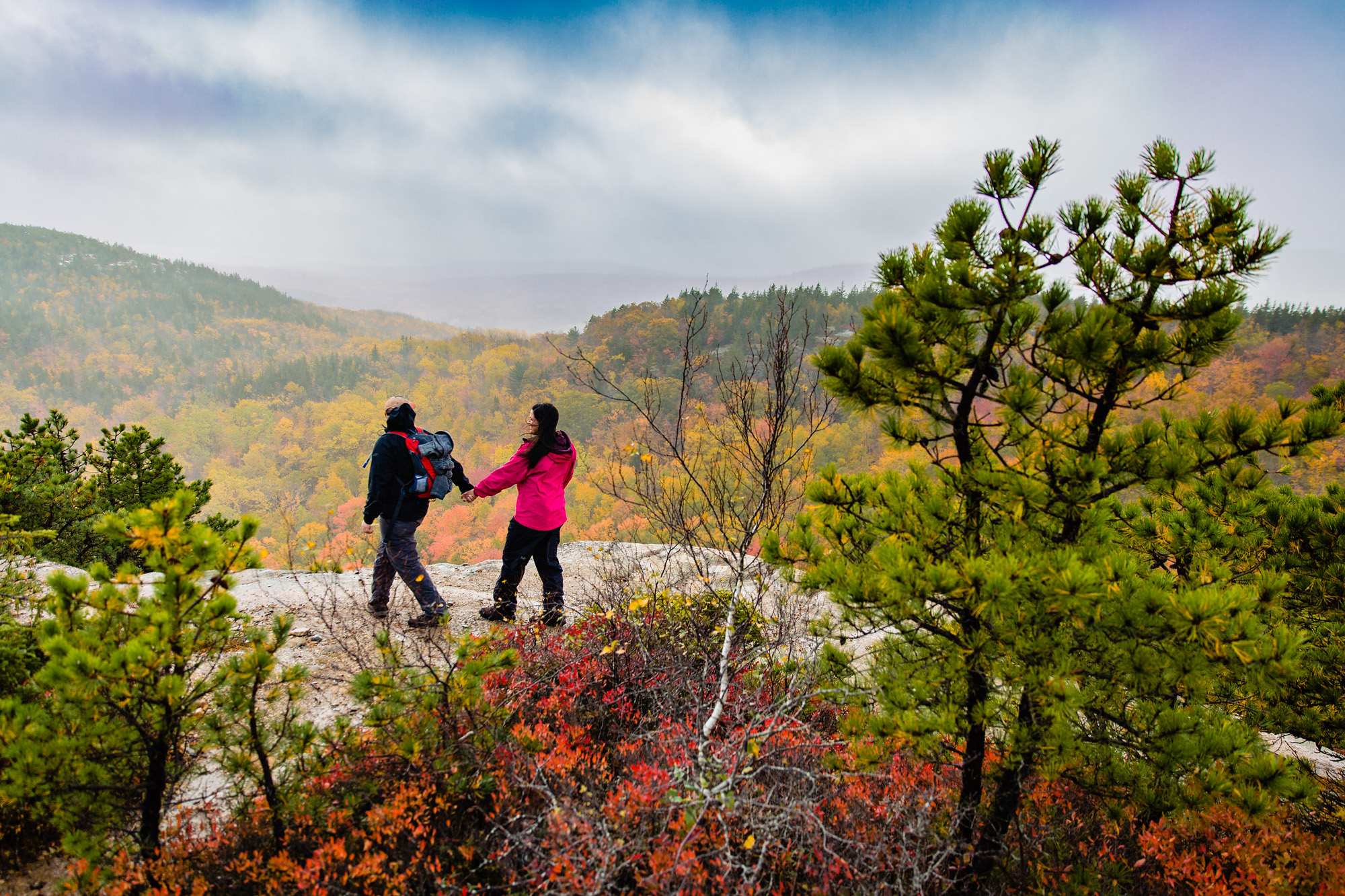 A couple hikes Beehive in the fall in Acadia National Park